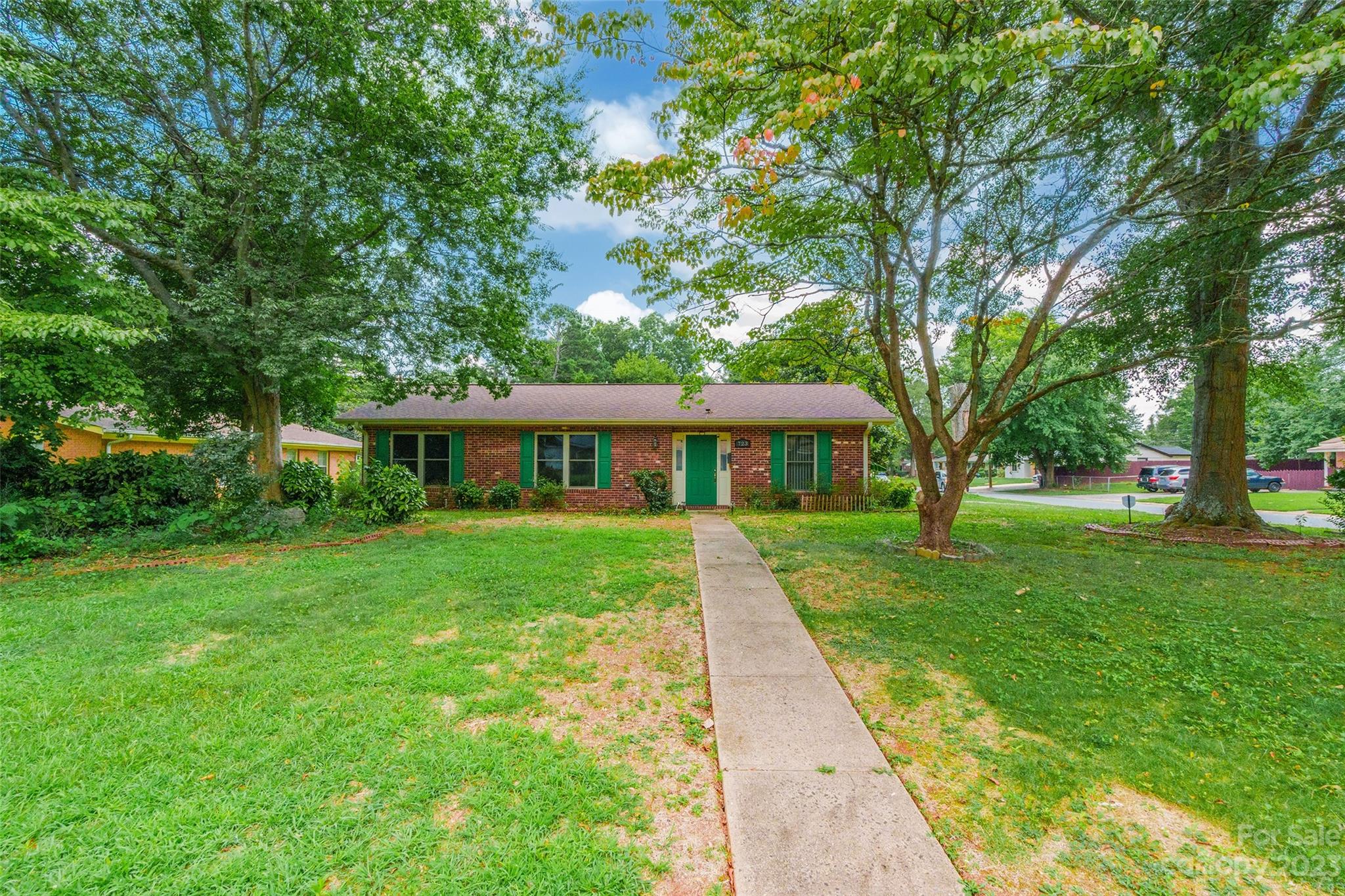 Conveniently located in Charlotte's Eastway neighborhood, this brick ranch has 3 bedrooms, 2 bathrooms, and was totally rebuilt and remodeled in 2015! This home sits on a corner lot with an attached carport, patio, and shed in the back yard. Vaulted ceilings and recessed lighting throughout give the interior an open feel. There are ceiling fans in the bedrooms and updated bathrooms. The kitchen island can be moved! Great opportunity to make this home your own!