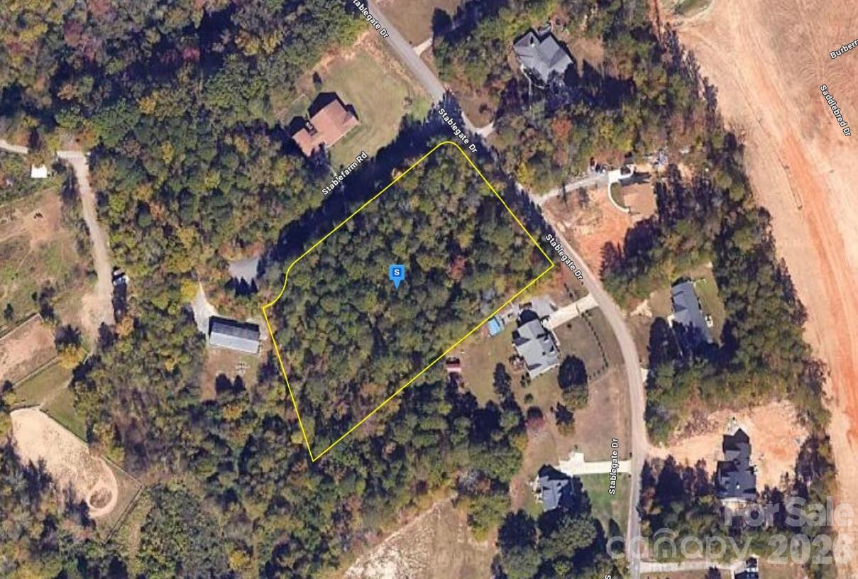 This vacant cul-de-sac lot offers an excellent opportunity to build your future home or make a smart investment. Situated in Stablegate Farms, the property features 2.2 acres of wooded terrain. Well and septic are required. Positioned high near the road and gently sloping farther into the property, the lot offers added character and potential for a custom home site. Enjoy a peaceful setting with no HOA deed restrictions while benefiting from nearby development, including a neighboring PUD with newly constructed homes. Conveniently located near shopping, dining, schools, and major highways, the property provides easy access to city amenities. Whether you’re looking for a private retreat, a development opportunity, or a long-term investment, this lot provides the flexibility and location to suit your needs. Listing is for land only and comes As Is. Street addresses can be for listing purposes only and vacant land will receive a true street address once improved.