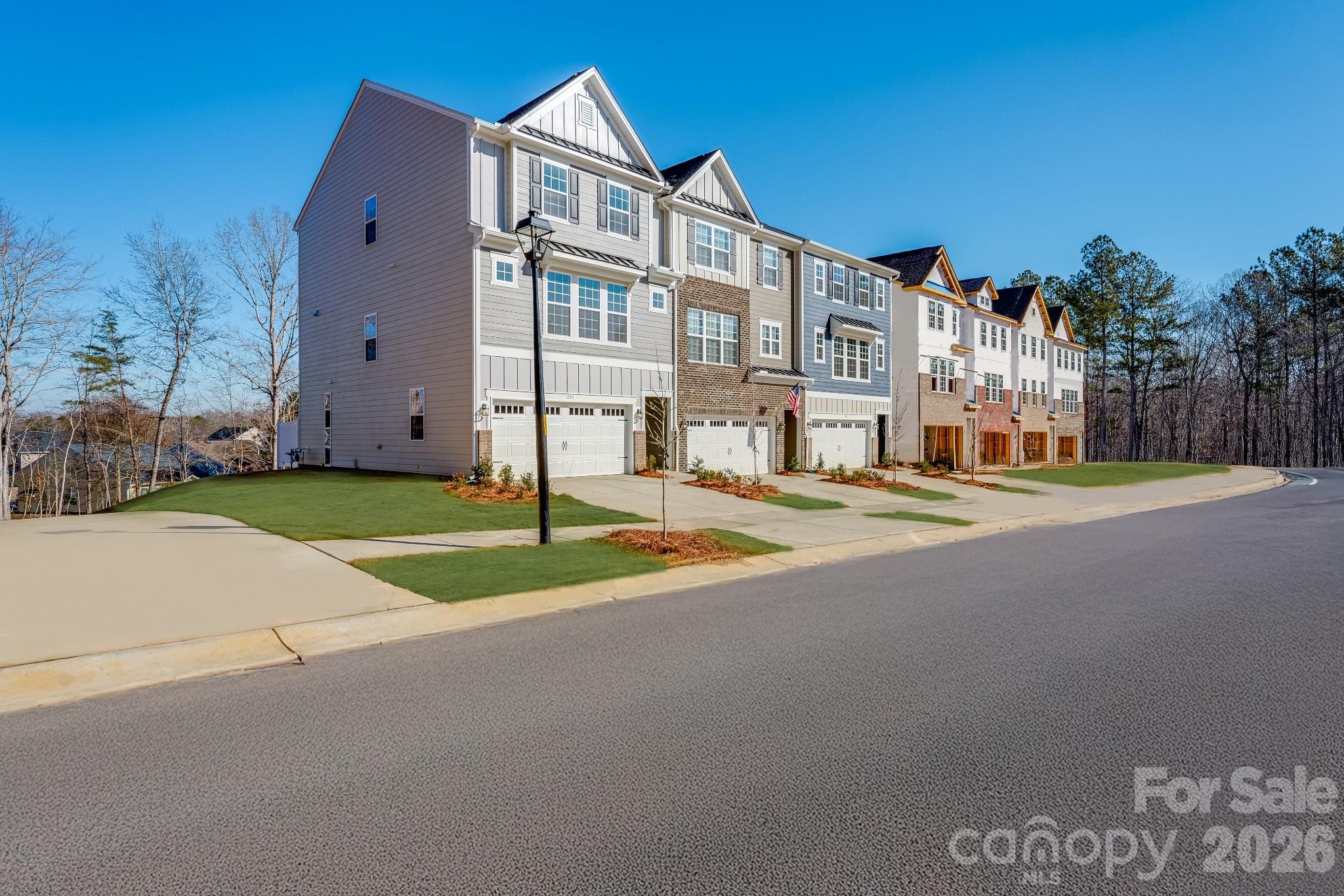 End Unit**This new townhome presents three stories of modern living space. On the lower level is a spacious fourth bedroom made for gatherings, while upstairs is the open-concept main living area. It includes a sprawling family room bathed in natural light, an intimate dining room and a chef-ready kitchen, plus a deck for outdoor moments. On the top level are two secondary bedrooms and the serene owner’s suite to provide peaceful retreats. Plus, our signature Everything's Included program means you will get quartz or granite kitchen countertops, stainless steel appliances, luxury vinyl plank flooring, and so much more at no extra cost! Close to downtown Waxhaw, local shops, restaurants, retail and grocery stores. Just a short drive away are Uptown Charlotte and the Promenade at Carolina Reserve shopping center.