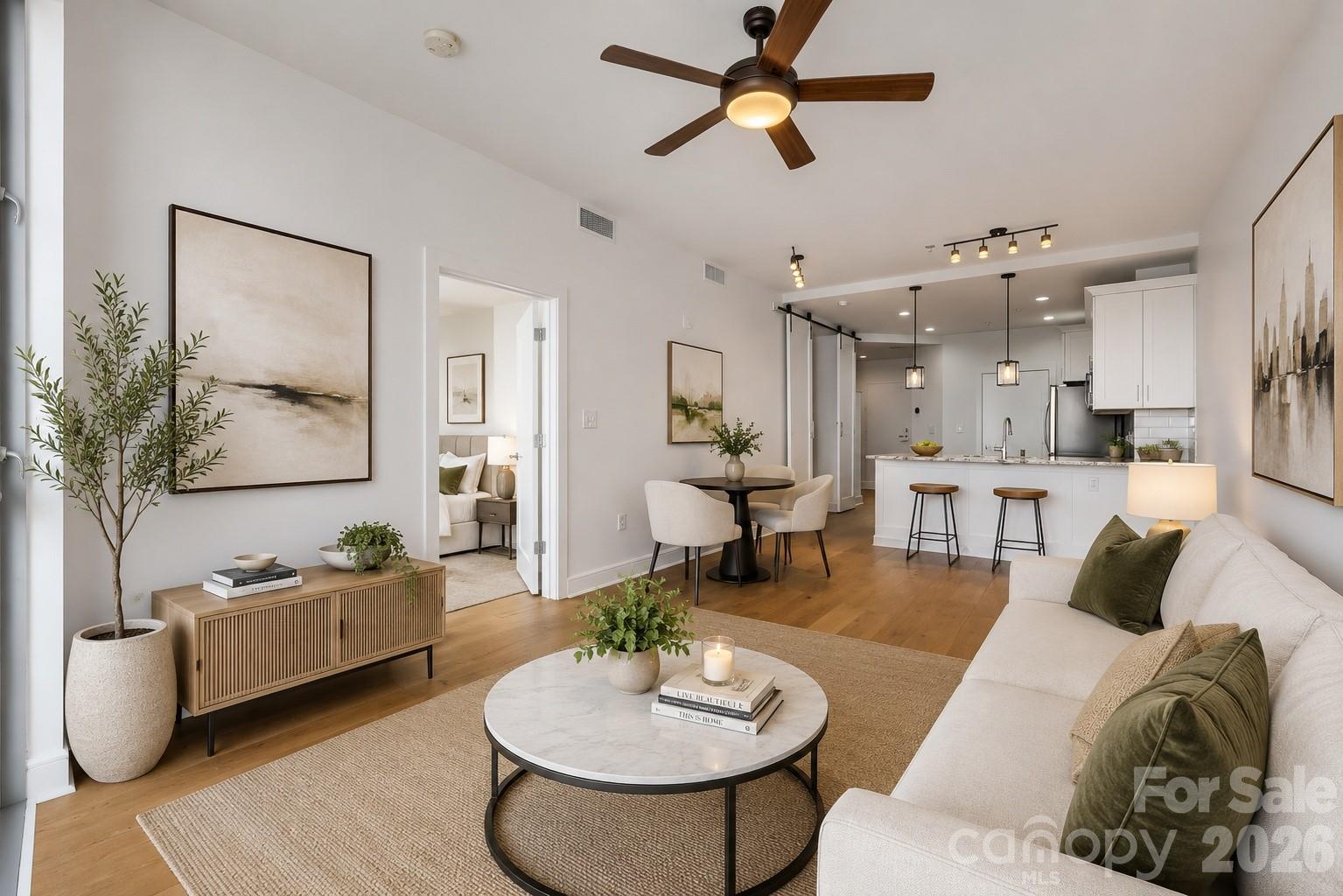 Experience elevated Uptown living in this beautifully renovated 1 bedroom Plus DEN -condo at 333 West Trade, Unit 2002! Offering breathtaking skyline views and modern luxury, this move-in-ready residence has been extensively updated with high-end finishes throughout. Recent renovations include new flooring installed last year, upgraded cabinetry, stylish countertops, and a fully refreshed kitchen featuring all new appliances. Major system upgrades include a brand-new HVAC system and new washer & dryer, providing comfort, efficiency, and peace of mind.
This light-filled open-concept floor plan offers spacious Kitchen and Living areas, ideal for entertaining or enjoying vibrant Uptown Charlotte living. Step onto your private balcony and take in stunning city views from the 20th floor. Located in one of Uptown Charlotte’s premier high-rise communities, residents enjoy convenient access to restaurants, nightlife, Panthers games, entertainment, shopping, and the light rail. Building amenities include:
Sky terrace Pool, Gas Grills, Clubhouse, Gym, Fire Pit, EV charging stations, Amazon Hub.
Whether you are searching for a luxury Uptown Charlotte condo, a fully renovated high-rise residence, or an exceptional investment opportunity, this condo delivers style, location, and value. Don’t miss your chance to own a beautifully updated condo in the heart of Charlotte!