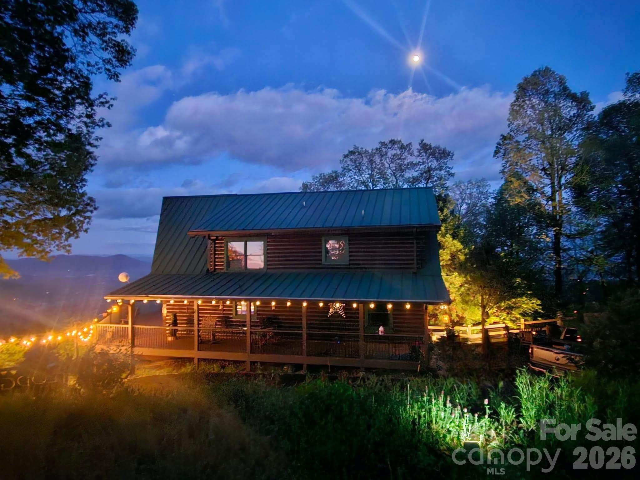 Enjoy the peace and tranquility of your own slice of North Carolina's mountain paradise nestled the stunning views of the Blue Ridge Mountains in Riverbend Highlands perfectly positioned on 4.63 acres! Mountain living at it's finest! This is the kind of mountain escape people search for, but rarely find...EXQUISIT fully furnished 3BD/2.5BA cabin spanning over 3,000 square feet offering the perfect blend of comfort, privacy, and natural beauty! Make it your quiet mountain escape or an part-time income producing retreat! Covered front porch welcomes you inside to a spacious family room featuring cathedral ceiling, massive wall of windows to the view, and a stone FP/wood! Open to the kitchen with all appliances, breakfast bar, pantry, and dining area! 2 bedrooms, full bath tub/shower, and a half bath! Up the staircase to your seating area to your exquisite primary suite with it's own stone FP/gas logs, seating area, and a private deck to soak in the views! Primary full bath with tiled walk-in shower! Down to the basement to the media room, wet bar, stone FP/gas, laundry room with W/D and mop sink, flex room, and a utility room with tankless water heater and stand up freezer.! Enjoy the privacy of your own hot tub/Bullfrog. Expansive wrap around decks on main and lower levels! Conveniently located to Chimney Rock State Park and Village, Lake Lure to reach iconic hikes, waterfront, close to shopping and restaurants , or major highways! Schedule your appointment soon!
