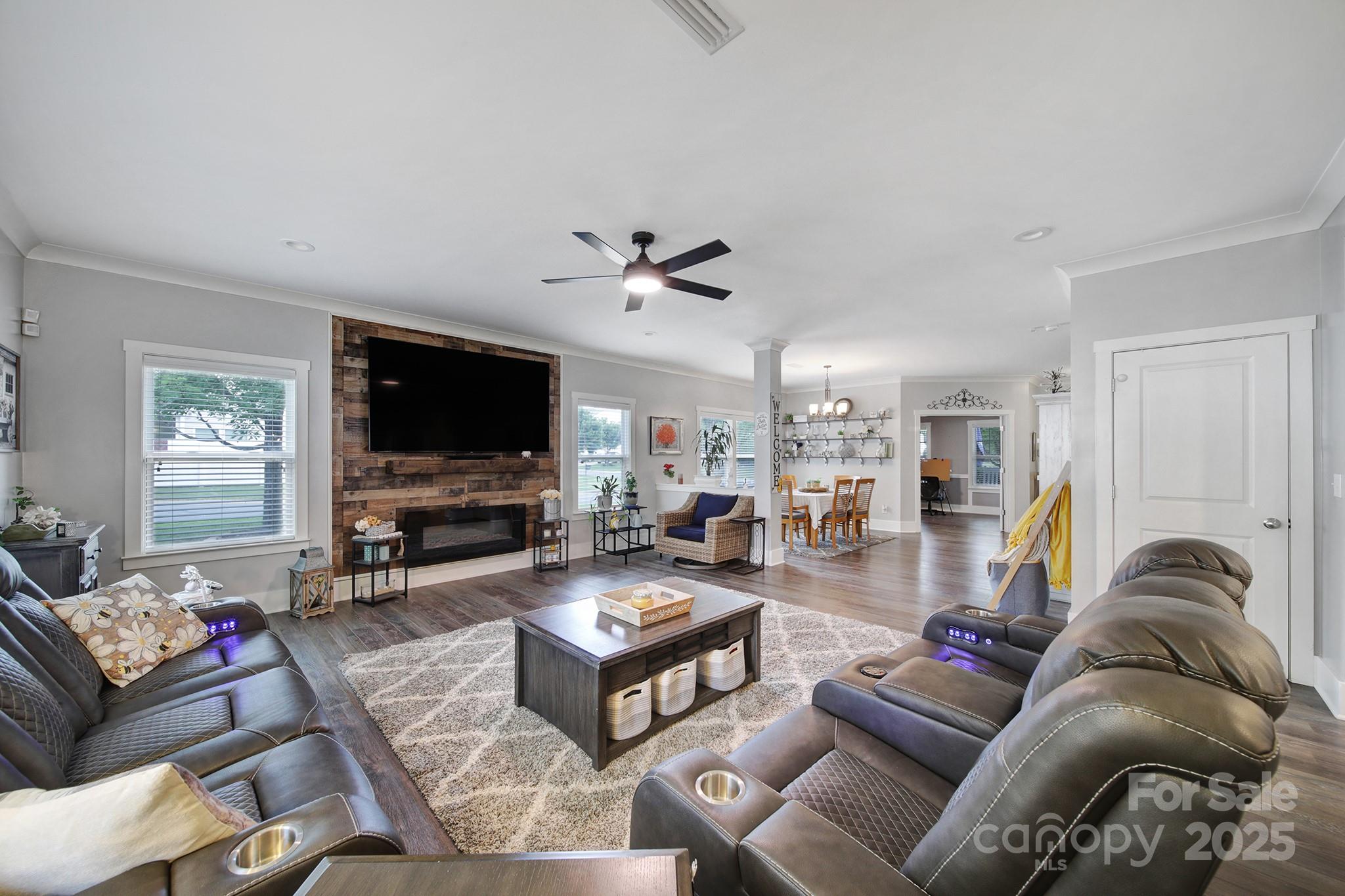 This Is The One You Have Been Waiting For! 6 Bedrm 4 1/2 Bath, Enormous Great Rm, Electric Firepalce, 85" TV In Great Rm Conveys. Freshly Painted Thoughout. Updated Faucets & Toilets. Chef's Kitchen w/Granite Island/Counters, Luxury Vinyl Plank Flooring Throughout 1st & 2nd floor. 2nd Level Features X-Large Primary Suite w/Luxury Shower, Garden Tub, Tile Floor & Walk-In Closet. 3 Additional Bedrms Also Have Walk-In Closets, Jack & Jill Bath Plus Another Full Bath & Laundry Room. Upgraded Lighting In 2 Bedrms w/Hidden Fans Inside Them, That Come Out w/Remote, Try Them Out! New LED Light Fixtures. The 3rd Level Boasts A Huge Bonus/Recreation Rm, Large Bedrm & Full Bath. Level Back Yard With A Patio & Retaining Wall. The 2 Car Garage Has Pegboard, Insulation & Sheetrock Walls. 30 Beautiful Energy Efficient Solar Panels, PAID In Full On The Back Of The Roof (Powered By SUNPOWER) That Pays Up To 85% Of The Power Bill & Has A Warranty. Great Fort Mill Schools! Don't Miss This Beauty!