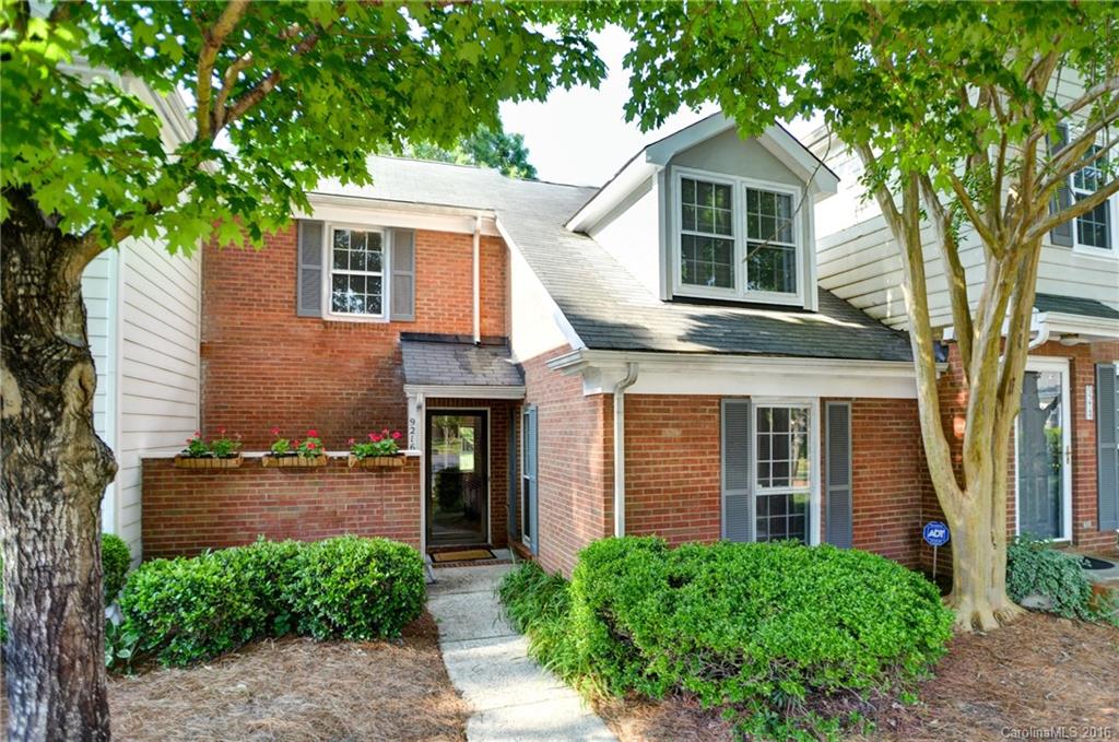 Wonderful open floor plan with soaring two story great room. Dual master bedrooms & bathrooms - one up and one down. Great Room has ceiling fan and brick fireplace with gorgeous mantle and opens to kitchen. Kitchen has island with bar stool seating and black appliances. Back patio overlooks park like setting. Completely move in ready with fresh paint and all new flooring throughout. Awesome South Charlotte location convenient to shopping, highways & restaurants.
