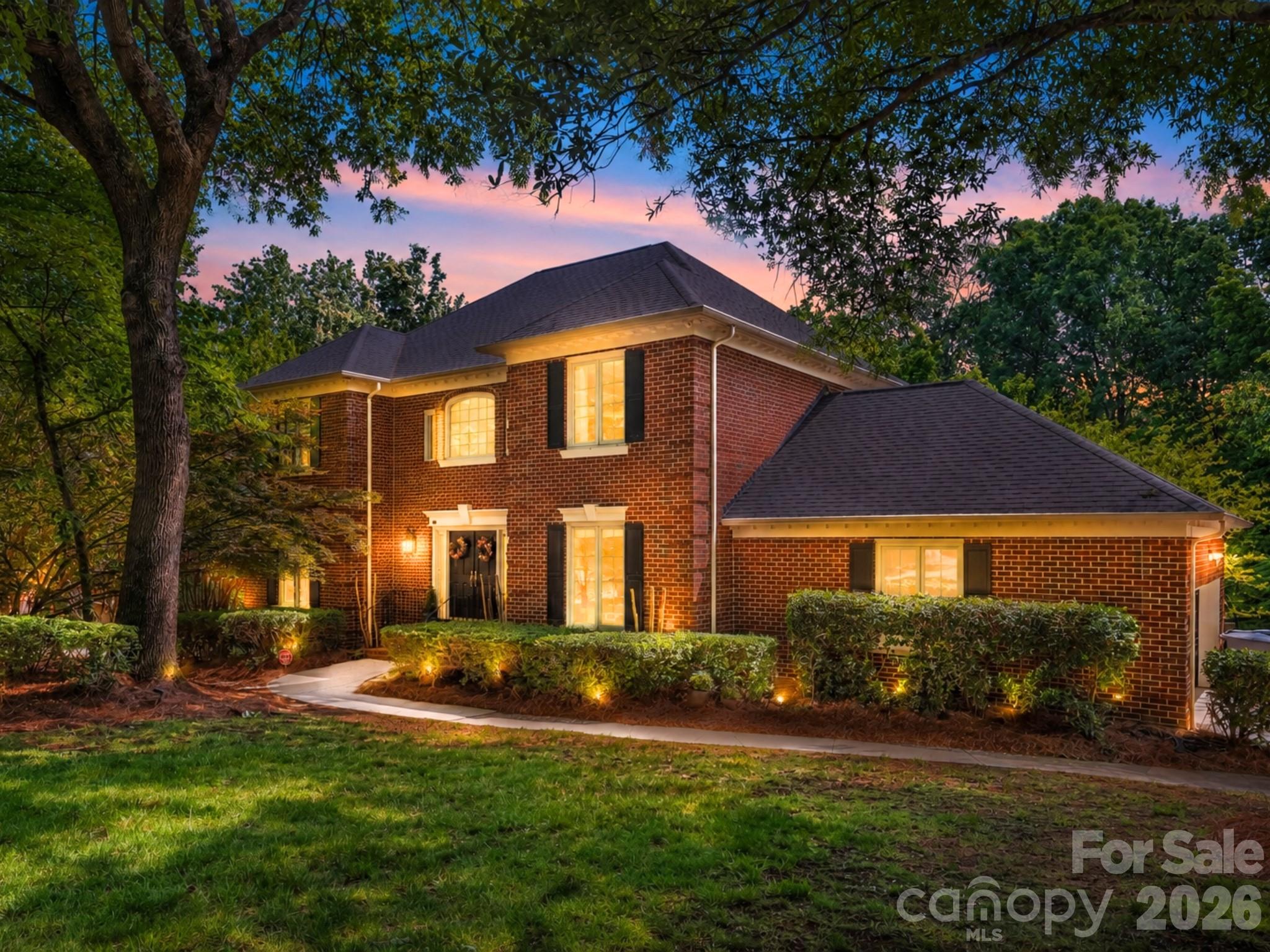 Positioned on a private wooded cul-de-sac homesite in the highly sought-after Huntington community, this full-brick South Charlotte residence blends timeless character, functional space, and thoughtful updates in one of the area’s most established neighborhoods.

Offering nearly 3,900 square feet, the home features fresh interior paint, new upstairs carpet, abundant natural light, and a versatile layout designed for both everyday living and entertaining. The main level includes spacious gathering areas, a dedicated sitting room or home office, and an inviting living room anchored by a gas fireplace.

The updated kitchen features quartz countertops, tile backsplash, and a newly installed cooktop (this week), while maintaining a seamless connection to the home’s primary living spaces and outdoor entertaining areas.

Upstairs, the spacious primary suite serves as a true retreat with a fully renovated spa-inspired bath, while the refreshed secondary bath continues the home’s updated feel throughout.

The finished walkout basement adds exceptional flexibility with a second gas fireplace, additional living space, bedroom, and full bath—ideal for guests, a media room, fitness space, or multi-generational living.

Outdoor living is a standout feature with a screened porch, expansive deck, and peaceful wooded backdrop creating a private setting rarely found in South Charlotte.

Additional improvements, including a 2023 HVAC system and recently installed cooktop, provide added peace of mind for today’s buyers.

Located in the desirable Huntington community with neighborhood amenities including a pool, tennis courts, and top-rated schools—all just minutes from SouthPark, The Arboretum, dining, shopping, and everyday conveniences.

Private setting. Flexible living. Exceptional South Charlotte value. A rare opportunity in Huntington!