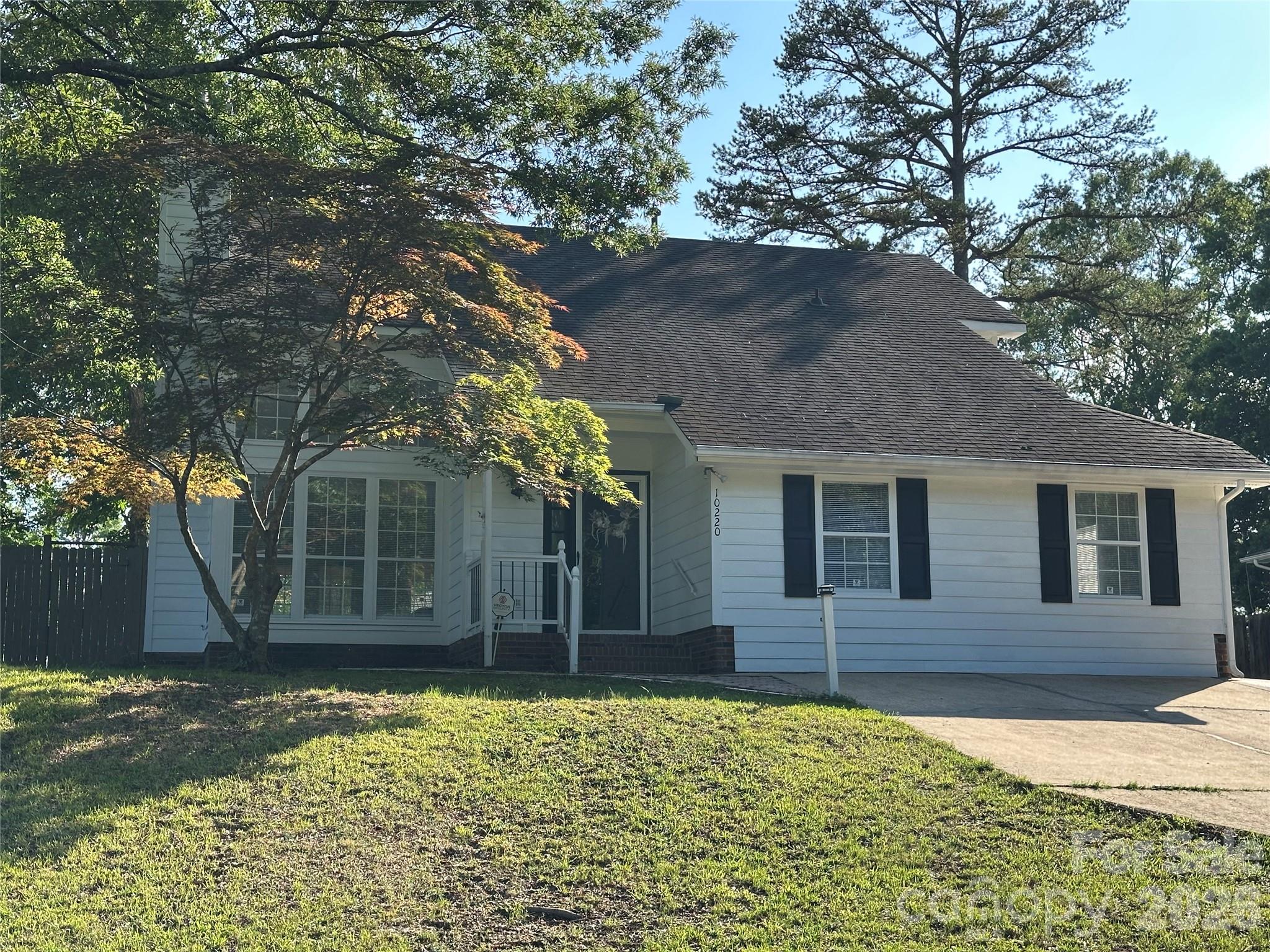 !!! GREAT LOCATION IN CABARRUS COUNTY WITH #1 SCHOOLS IN THE HARRISBURG AREA !!!  2 Bedrooms & 2 Full baths on Main level + 2- story Great Room with FP AND  an in-home Office / Upstairs has 2 Bedrooms with walk-in closet and gracious closet space + Full Bath / New Kitchen countertops, fixtures & cabinet hardware / Fresh interior paint 2026 & NEW CARPET + LVP flooring 2026 (Please NO SHOES) !!!  Exterior painted 2021 / Replaced water heater 2015 / Central Air 2018 / New architectural shingled Roof 2012 / New water closets in Master Bathroom & Upstairs bathroom / New ceiling fans with 3 having remotes / Covered back deck with adjoining Patio + FENCED BACKYARD / Workshop / Storage building in back corner of yard sold as is, where is.  Low Cabarrus County taxes only. ***** SECURITY SYSTEM ALWAYS ON . . . . . Confirmed Appointment Required *****. This home lays in the 100% financing availability through USDA !!!