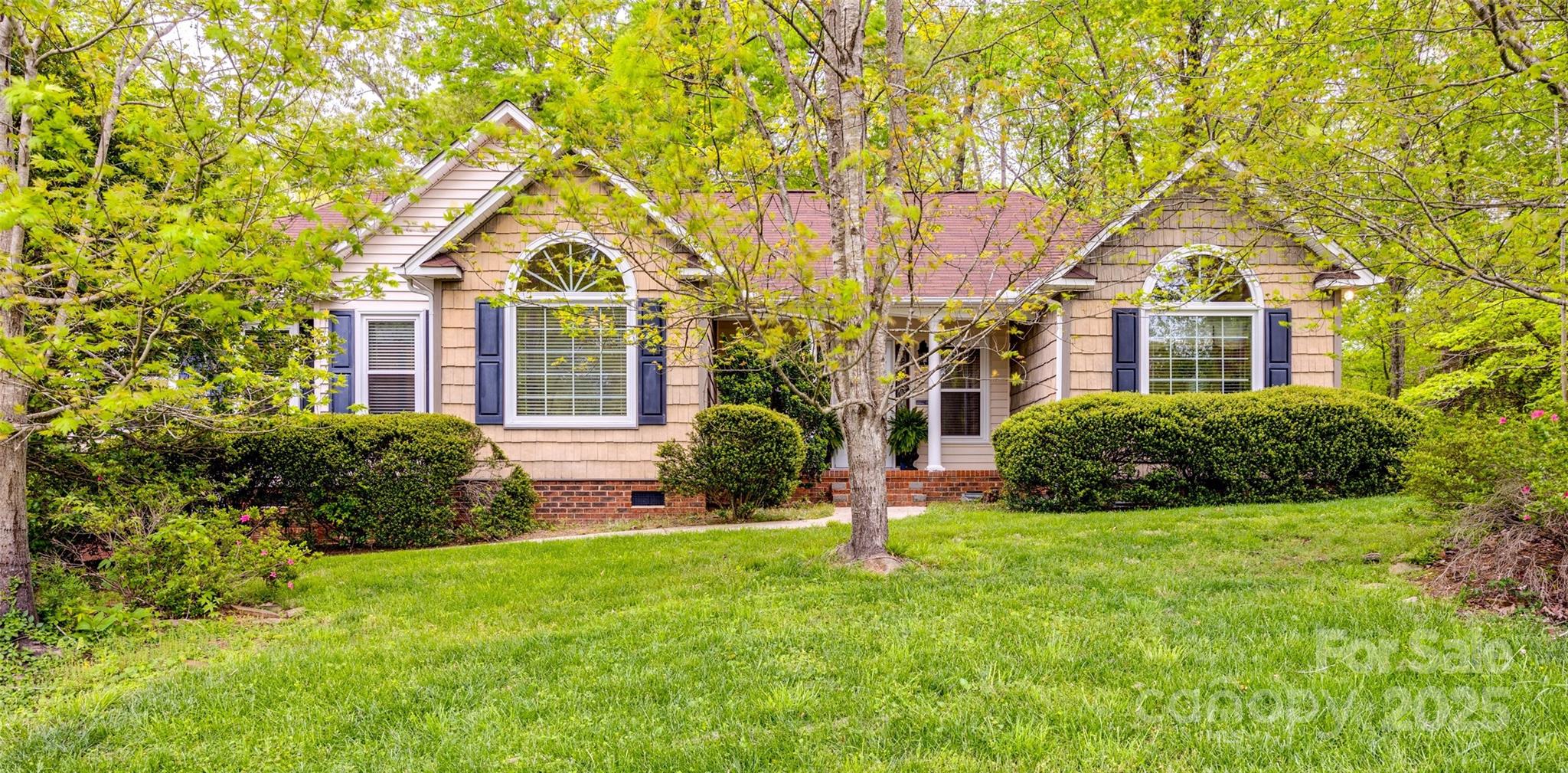 Welcome to your dream home! This stunning property boasts a thoughtfully designed split floor plan that offers privacy and functionality. The home features large windows that fill the interior with natural light and showcase the beautiful views of the mature landscaping and woods behind it. 
After a long day, unwind in the luxurious jacuzzi tub, the perfect spot to relax and rejuvenate. Nestled in a quiet cul-de-sac, this home sits on a half-acre lot, providing ample outdoor space for relaxation and recreation. Enjoy the tranquil creek in the back, creating a peaceful retreat right in your backyard.
 Added bonus, it is close to I-77, shopping, and dining. A new roof was installed in 2021, and windows in the last ten years. HVAC is under parts and warranty with Morris Jenkins. 
 Don’t miss out on this amazing opportunity to own a well-maintained home in a prime location.