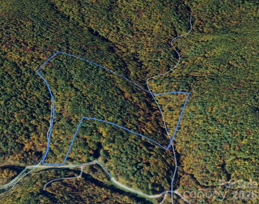 Rare opportunity to own 28.33 +/- acres of unrestricted land in the peaceful countryside of Taylorsville, North Carolina. This property offers the freedom and flexibility that’s becoming increasingly hard to find—no HOA, no deed restrictions, and endless potential.

The land features a mix of timber and natural terrain, making it ideal for a private homesite, recreational retreat, hunting property, or investment tract. A creek runs through the property, providing a natural water feature that enhances both the beauty and usability of the land.

With road frontage on Russell Gap Road, access is convenient and allows for potential build sites. Whether you’re looking to build a primary residence, bring in a modular or manufactured home, create a weekend getaway, or hold for future investment, this property offers unmatched versatility.

Enjoy the privacy and quiet of rural Alexander County while still being within a reasonable drive to town amenities.

15 Min from Taylorsville.  20 Min from Wilksboro on NC HWY-16.  Less than 1 hr from Boone.
