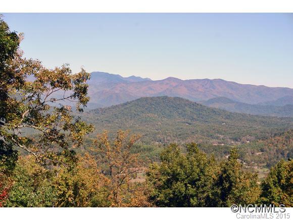 Lot 861 is a beautifully forested mountain lot perched on a knoll with spectacular long-range, layered views of the Blue Ridge mountain range and valley to the north. Perfect for a home with big, abundant windows and decks.