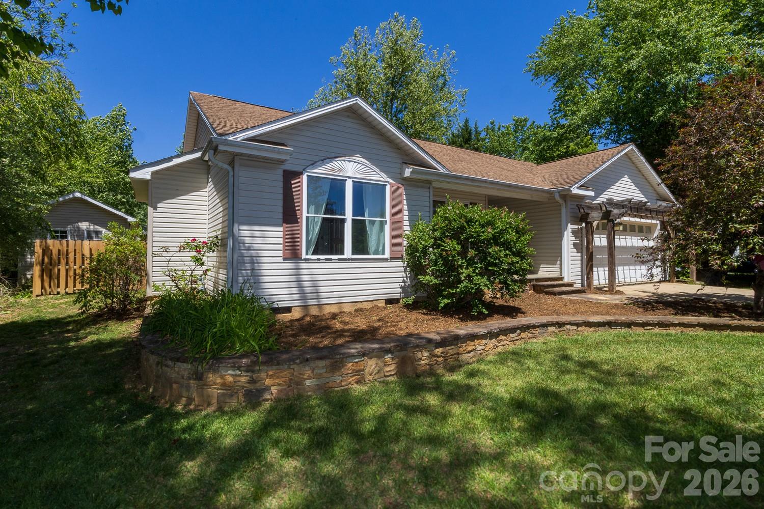 Tucked into a vibrant and welcoming community, this charming 3-bedroom, 2-bath home at 55 Eden Glenn Road offers the perfect blend of comfort, convenience, and character. Set on a .38-acre lot, the property features a fully fenced backyard—ideal for pets, play, or private outdoor gatherings—along with a versatile workshop and ample storage for hobbies or projects.

Inside, you’ll find warm hardwood floors and an abundance of natural light that fills the living spaces, creating an inviting and airy atmosphere throughout. The layout is both functional and comfortable, making it easy to settle in and feel at home.

Located just minutes from both Black Mountain and Asheville, this property offers quick access to local dining, shopping, and outdoor recreation while still maintaining a peaceful neighborhood setting.

Whether you’re looking for a primary residence or a place to enjoy the best of Western North Carolina living, this home is a must-see.