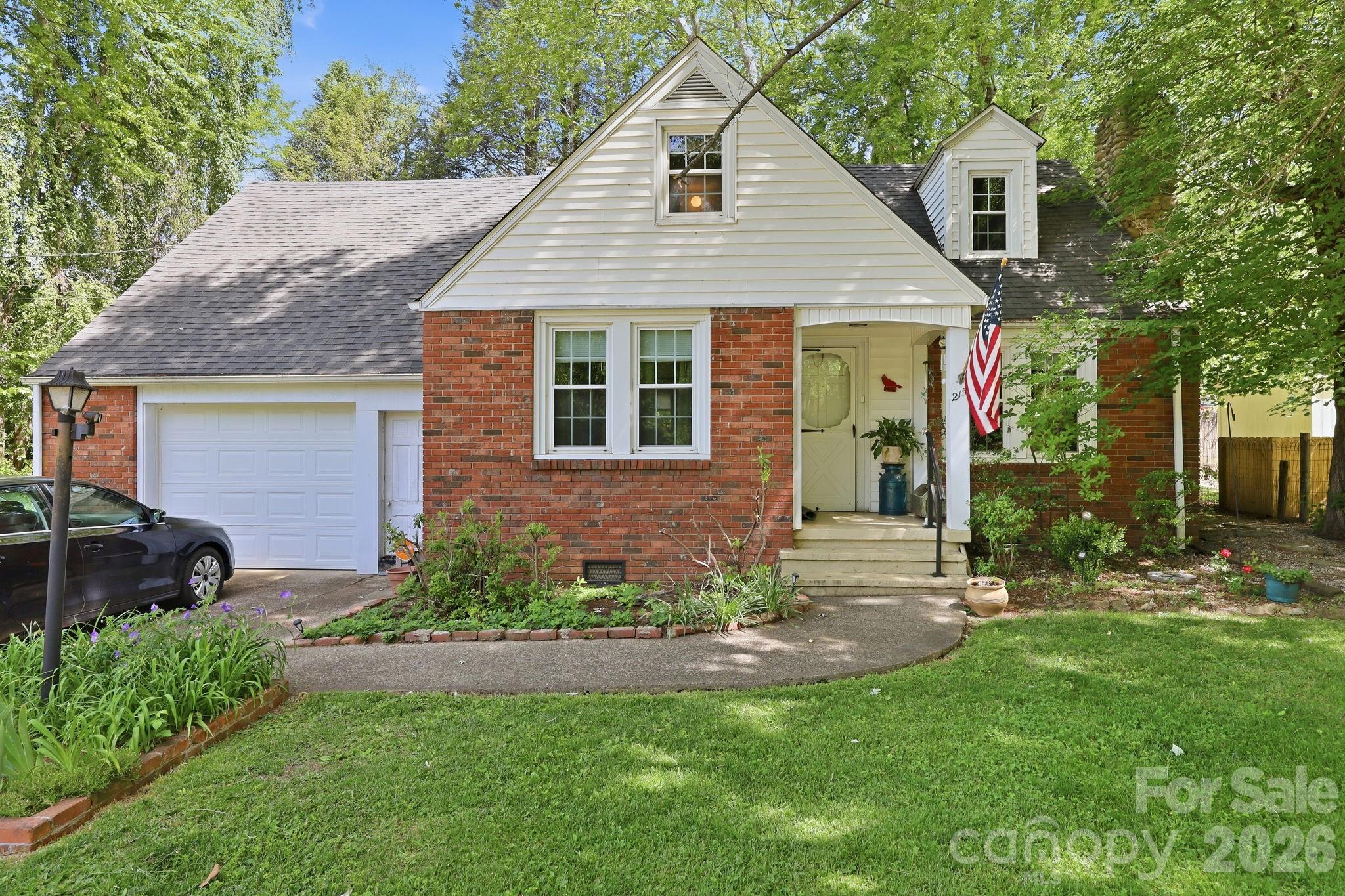 Located just about half a mile from downtown Black Mountain, this home offers easy access to local shops, restaurants, and everything this highly desirable area has to offer. You're also just minutes from Lake Tomahawk, Black Mountain Golf Course, and the scenic campus of Montreat College, where you’ll find peaceful park areas to enjoy year-round. Plus, you're a short drive to Asheville and Old Fort, giving you the best of both convenience and mountain living.

Situated on 0.33 acres, this classic 1950 brick home is full of charm and opportunity. The property offers a beautifully maintained front yard and a more private backyard space to relax or entertain in. The home provides a comfortable layout with plenty of potential for a buyer to add their own personal touches over time. Hardwood floors underneath carpet: upstairs and downstairs. 
Home is being sold as-is. Seller has not lived in or regularly used the upper level in recent years, and it may need repairs/update, buyer to verify. Home has been priced below tax value to reflect needed updates and repairs. Roof leak repaired in 2015, with a new roof and new flashing and grout around chimney, and new topper on chimney. Windows are the cooling system. 

This property is also listed as commercial.