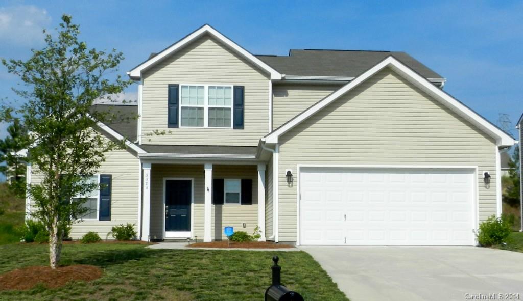 Compare to new construction! This home smells new, shows new, and is perfectly kept. The upstairs area has never been used. Move into a *new* home for less than new construction costs in the neighborhood! Priced below tax value. Versatile floor plan with master down, open kitchen, two story great room, spacious loft area, two car garage, berm for privacy in backyard.
