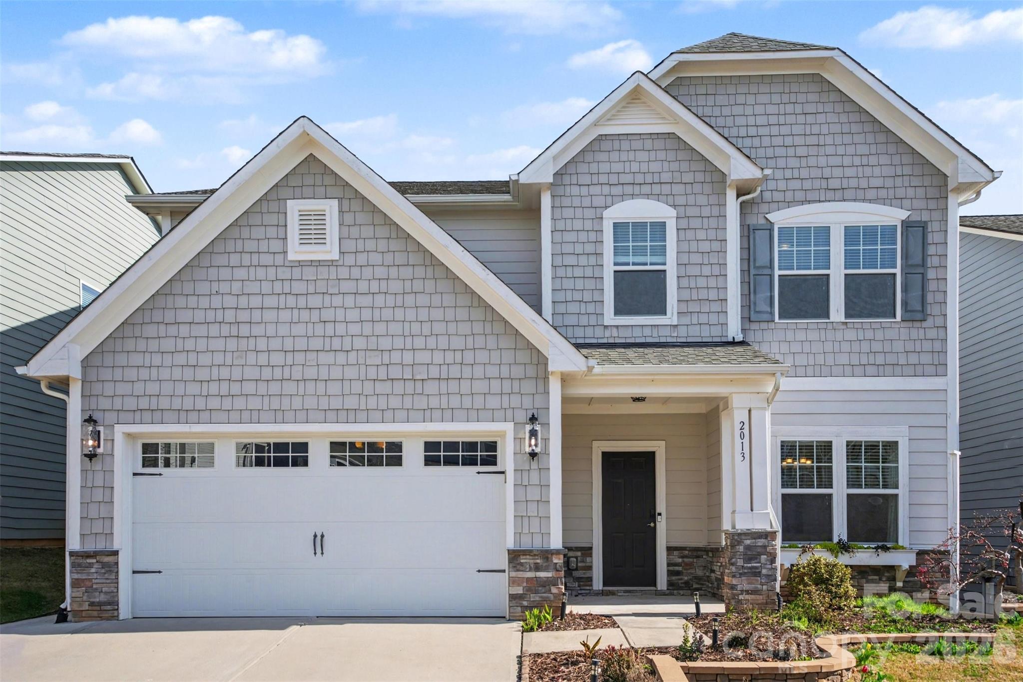 Be on Lake Wylie or the Catawba River in under five minutes from your front door. Covered patio built for game days. Main-level guest suite.
This Lake Ridge home checks boxes most buyers don’t find in one place.

Five bedrooms with a main-level guest suite and adjacent full bath, perfect for visitors, long-term guests, or a private home office. Open kitchen with gas range, granite counters, stainless appliances, and center island seating four flows into the generous living room with fireplace. This is where life happens.

Upstairs primary suite delivers the retreat you’ve been picturing: walk-in closet, dual vanities, soaking tub, separate tile and glass shower, and space for a sitting area or morning coffee spot. Three additional bedrooms plus a bonus room give everyone room to spread out, playroom, home gym, or flex space, your choice. Built-in drop zone with bench and hooks keeps daily life organized. Laundry room with folding counter and cabinets makes the mundane manageable.

The backyard is the closer. Covered patio with pergola, ceiling fan, string lights, and TV mount overlooks a fenced yard with extended paver patio, set up for almost year-round use. Oversized garage with epoxy floors fits the vehicles and the gear.

Located in South Carolina with comparatively lower property taxes than neighboring North Carolina.

Close to Catawba Park, Carowinds, Baxter Village, and Kingsley shopping and dining. Lake Ridge amenities include pool with slide and separate kid pool, basketball court, tennis/pickleball courts, bocce, clubhouse, fitness center, and paved trails. Fort Mill schools are nearby and easily accessible.

Approx. 25–30 minutes to Uptown Charlotte and 25–35 minutes to Charlotte Douglas International Airport with easy access for commuting and travel.

Homes with this combination of layout, condition, location, and outdoor living move fast in Lake Ridge. Schedule your showing.