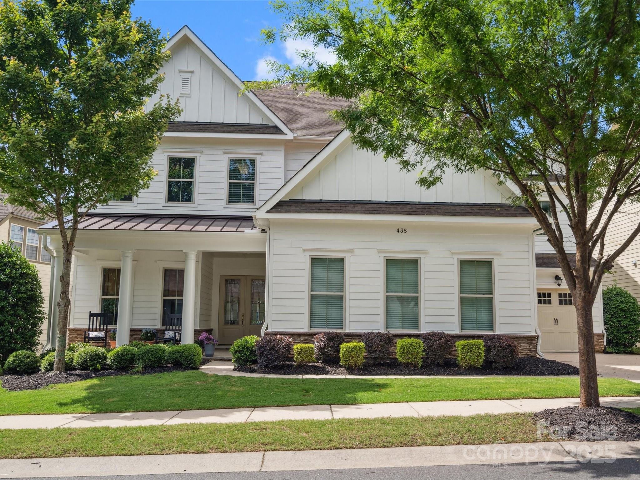 Beautiful, inviting home on a quiet cul-de-sac in Fort Mill’s Brayden, offering a perfect blend of comfort, space, and style. With 5 bedrooms, 4.5 baths, and many custom touches, it’s ideal for entertaining. Open kitchen features quartz counters, a 13-ft island, gas cooktop, and walk-in pantry, flowing to a vaulted family room with custom accents. A private guest suite and office/sunroom complete the 1st floor. Upstairs includes a spacious primary suite with sitting area, spa-like bath, and dual walk-in closets; a large bonus room, oversized laundry, and 13x7 storage room. Outside, enjoy 800+ sf of living space, with covered porch and expansive patio, in a private setting with home backing to 12+ acres of HOA land, plus winter pond views. Brayden’s amenities include a pool, playground, clubhouse, trails, and walkability to nearby restaurants - Inizio Pizza, Duck Donuts, and Firebirds. Top-rated schools, proximity to Kingsley, Baxter Village, and 25-min drive to Uptown and CLT airport.