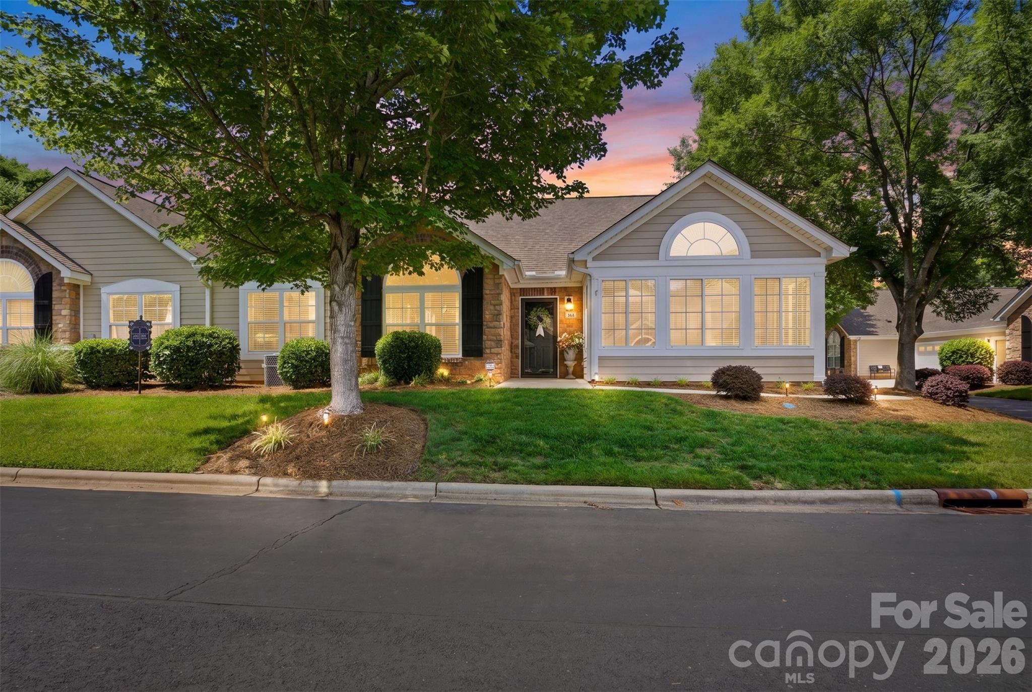 Enjoy low-maintenance living in this well-kept, freshly painted 2-bedroom, 2-bath home located in a desirable 55+ community. Inside, you'll find vaulted ceilings that create an open and spacious feel, along with a gas log fireplace that serves as the centerpiece of the living room. French doors lead to a dedicated home office or library, providing flexible space for work, hobbies, or quiet relaxation.

The bright sunroom offers a perfect spot to enjoy your morning coffee or unwind while overlooking the beautifully maintained landscaping. The HOA takes care of the grounds, allowing you more time to enjoy the community's active social club and amenities.

Additional features include a 2-car attached garage with built-in storage and an HVAC system that was replaced just one year ago for added peace of mind. Whether you're looking to simplify, stay active, or enjoy a welcoming neighborhood atmosphere, this home offers comfort, convenience, and easy living.