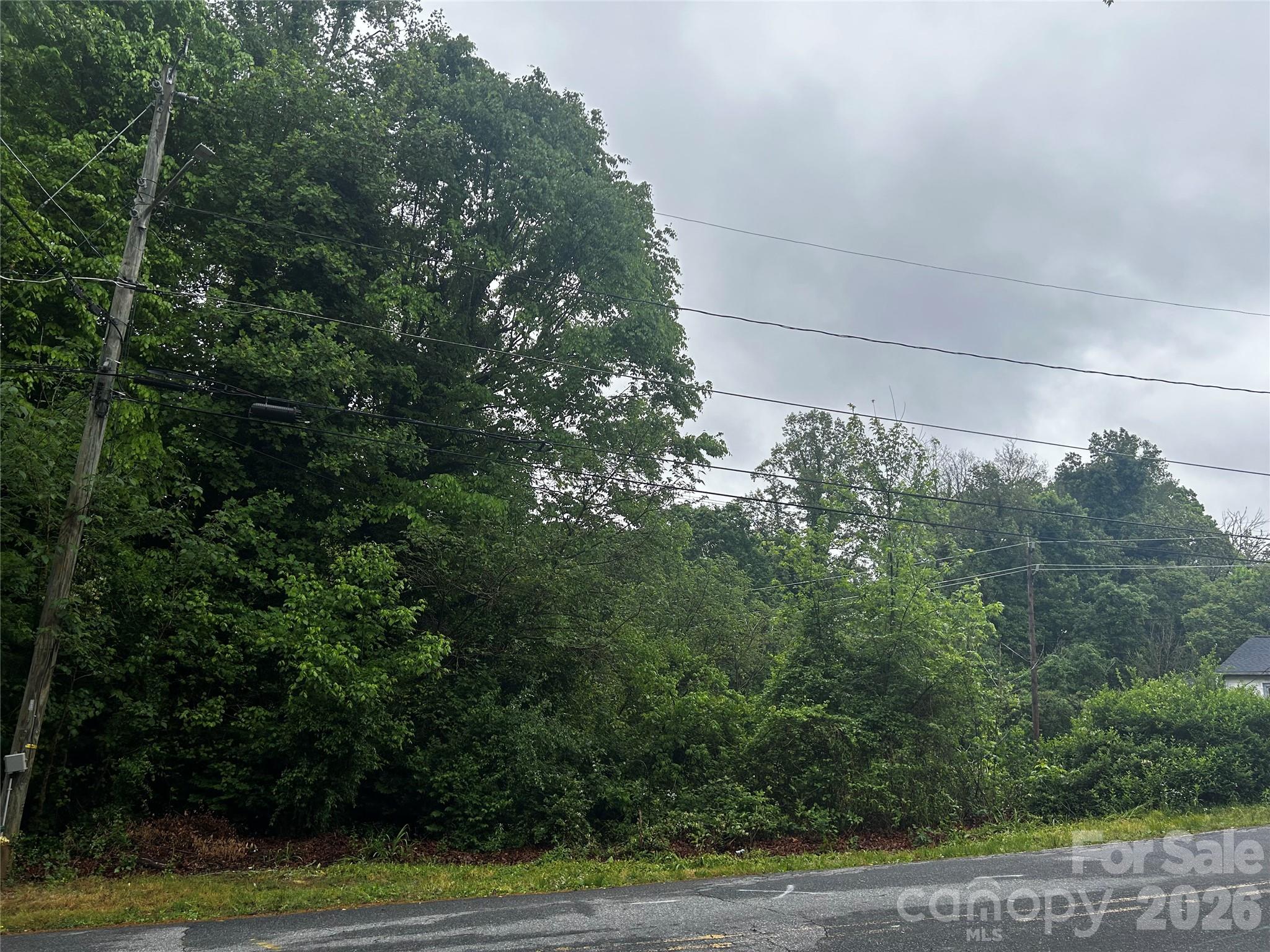 Opportunity awaits with this versatile and promising parcel of land, offering the perfect canvas for your vision! Whether you’re looking to build your primary residence or you’re a developer seeking your next investment project, this lot delivers exceptional flexibility - including the potential for a multi-family build. Its adjoining layout opens the door to numerous possibilities, giving you room to maximize both space and value. Zoned R-6, the land features accommodating setbacks of 35 feet from the front, 10 feet from the sides, and 25 feet from the rear, providing a balanced framework for creative and functional design. Don’t miss the chance to turn this adaptable land into something truly special!