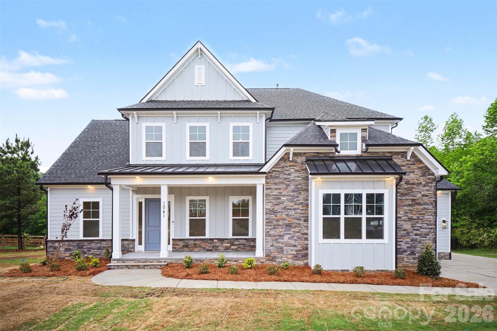 NEW CONSTRUCTION, MOVE-IN READY on 1+ ACRE in beautiful Shepherds Trace! This gorgeous Primary-Down plan offers just over 4,000 sq ft with 10' ceilings on the main level and 9' ceilings upstairs. The stunning Kitchen features double wall ovens, floor-to-ceiling cabinetry, and a large farmhouse island that opens to the Casual Dining area and spacious Family Room with a coffered ceiling and a two-way fireplace shared with the Sunroom. The Sunroom leads directly to the covered rear deck, creating seamless indoor-outdoor living.

A Formal Dining Room sits across from a dedicated Study that also connects to the Sunroom. The main-level Owner’s Suite includes a tray ceiling, dual vanities, a large walk-in tiled shower, a huge walk-in closet, and a secondary laundry area for added convenience.

Upstairs offers large secondary bedrooms, a spacious full laundry room, and an oversized loft perfect for recreation or additional living space. The 3-car garage provides ample room for vehicles, outdoor toys, or storage, while the expansive homesite offers potential for future outdoor living spaces or additional buildings. This home also has an encapsulated and conditioned crawl space! 

Shepherds Trace is ideally located near two state parks and just 15 minutes from Lake Wylie, offering quick access to water activities, dining, and entertainment. Enjoy privacy, space, and the beauty of nature in this exceptional community. Closing cost contribution w/preferred lender!