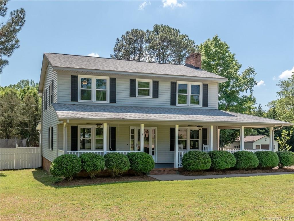 Charming home with wrap around front porch and on half an acre in Ft Mill! Downstairs includes the great room with wood burning fireplace, formal sitting room/office, dining room, kitchen and large mud/laundry room. Upstairs bedrooms are all good sized and have plenty of closet space. There is a sunroom off the back that overlooks the the fenced in backyard and patio area. Fresh paint throughout the home. Refrigerator, Washer and Dryer to remain.