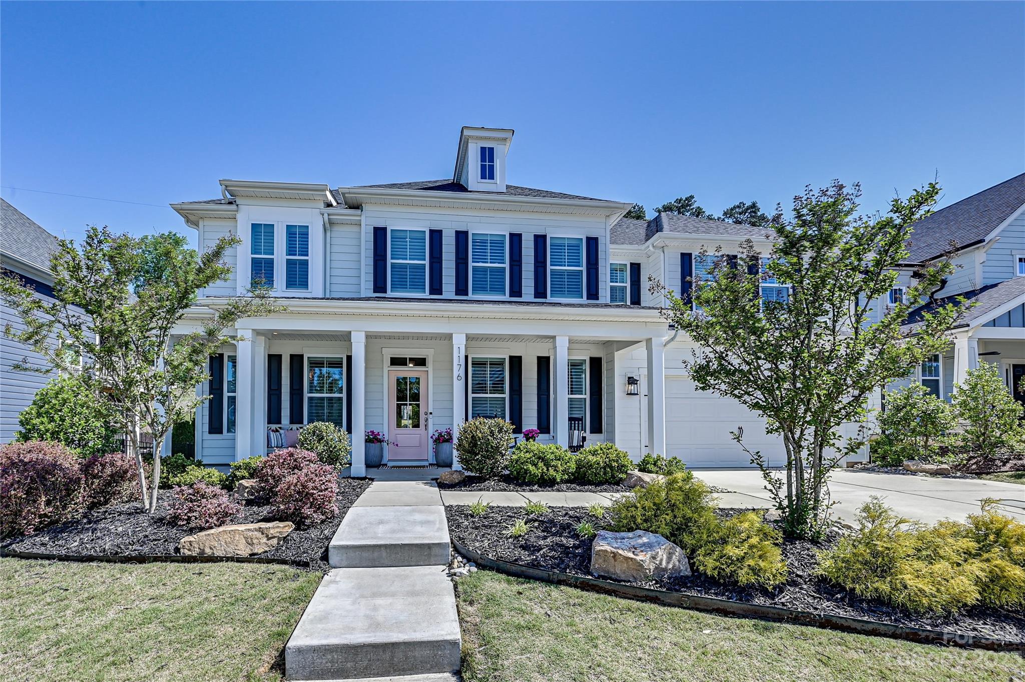Video: https://vimeo.com/user177831674/review/823321925/a46beef885  Your dream home awaits in Masons Bend, just a short commute to uptown via I-77. This Stonefield model craftsman-style home w/ a farmhouse feel is the perfect mix of modern convenience & upscale charm. With a deep wooded lot, you are afforded both the serenity & privacy you seek. The open floor plan integrates a stunning kitchen w/ a huge quartz island & offers ample space to relax & entertain in style. The 2nd floor boasts a large owner's room & spa-like ensuite w/ upgraded tile shower & frameless glass doors plus a separate soaking tub. Amenities include a clubhouse w/ a fitness center, multiple green areas, a playground, and 2 outdoor pools! Walking trails are woven throughout the neighborhood & along the Catawba River. Kingstown Elementary being right in the community brings about visions of kids riding bikes to school. We invite you to view this home in person-with over 135k in upgrades, there are too many to list.