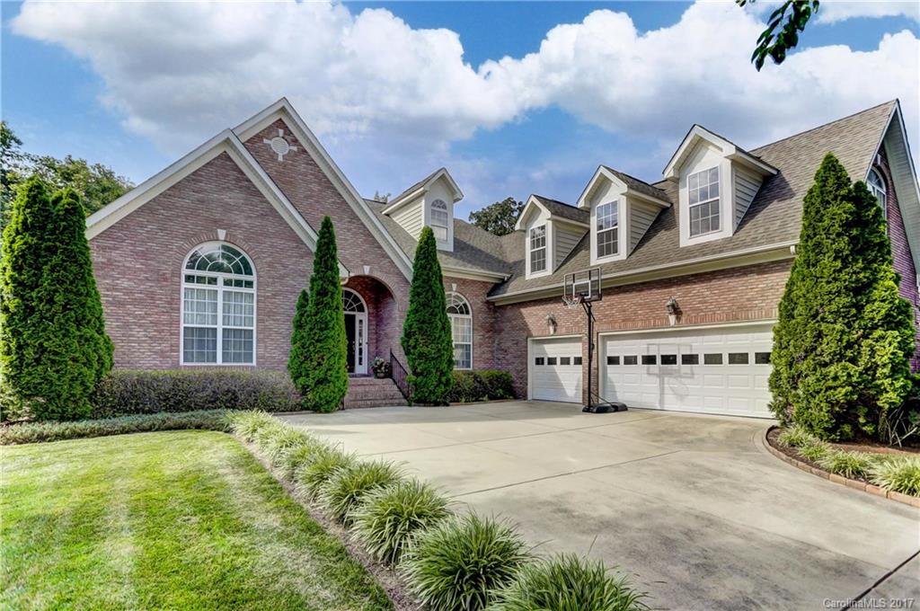 Full Brick Beauty in Desirable Champion Forest on Over Half Acre Private Wooded Lot! Gorgeous Main Level Living w/ Open Floor Plan-Hardwood Floors, Decorative Moldings & Architectural Details-White Gourmet Island Kitchen w/ Granite, Double Ovens, SS Appliances, Elegant DR & Bright Breakfast Room, 3 BRs include Spacious Owner's Suite -Versatile Bonus on Upper- Entertainer's Deck w/ Retaining Walls, Lush Landscaping, Stone Walkways w/ Access to Walking Trails *Upgrades Galore*Sought-After Schools*