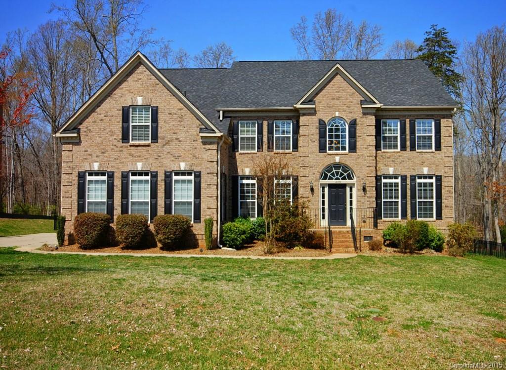 Spacious home on .64 acre flat lot backing to wooded natural area. Gorgeous in-ground pool, w/hot tub surrounded by travertine stone patio. Home fully upgraded in every detail. Gleaming hardwoods on main, soaring coffered ceiling in grt room, dual staircases w/iron balusters, upgraded lighting. All bdrms attached to baths w/granite counters. Massive mstr suite w/sitting area. Fabulous kitchen, 15' island, dbl ovens, S/S appls, gas cooktop, light-filled sunrm. 3rd flr bonus, bd, walk-in storage.