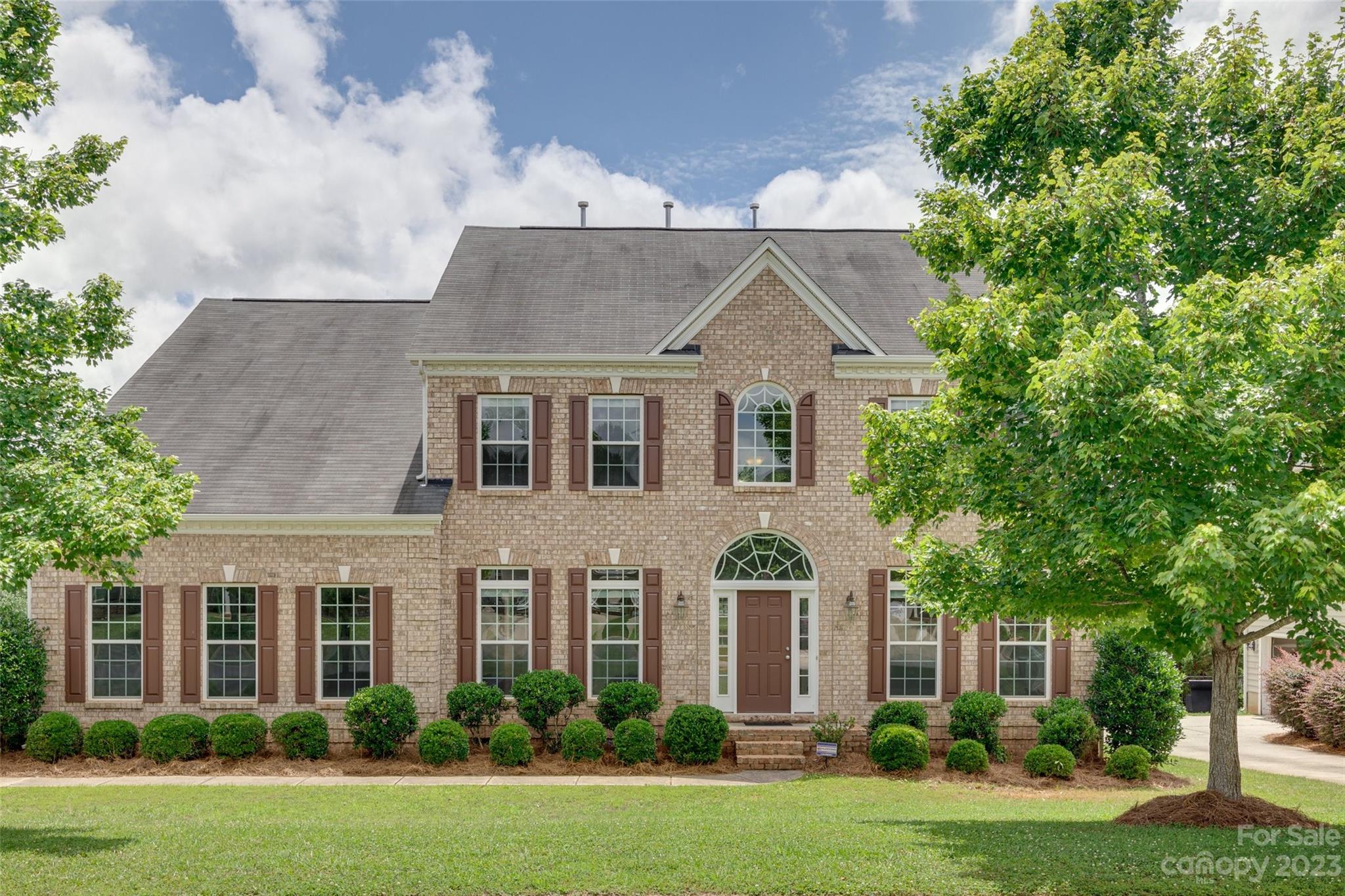 Welcome to FALLBROOK in Fort Mill, SC one of most desired communities! STUNNING 2 story offers an ideal blend of modern elegance & comfortable living. 4 beds, 3.5 baths, open floor plan & primary on main complete with luxurious en-suite bath, his/hers walk-in closets! Spacious & natural light throughout. Desirable corner lot, providing privacy & ample outdoor space. Plus a bright sunroom to relax & media/bonus for entertaining. Kitchen features large island, custom cabinets, granite & all-new high-end appliances; microwave & oven set, 5 gas burner cooktop plus refrigerator! Dining room seamlessly connects with a butlers pantry. Ideal for everyday meals & special occasions. No detail has been overlooked! Luxurious upgrades: New hardwood floors & 7'' baseboards throughout, window trim & blinds, all bathrooms with new quartz, sinks, & faucets plus fresh paint inside & out! 3-car side load garage. Community pool, clubhouse, playground, & lake. Near Anne Springs Greenway, shopping & dining!