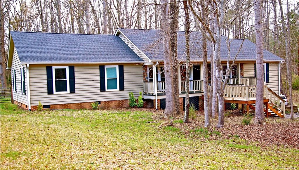 Get back to nature on this large 1.2 acre country lot. Huge open great room, gorgeous hardwoods & new paint throughout entire main floor, and some new carpet as well. New windows, HVAC and architectural roof installed in 2013. Sizable eat-in kitchen with granite, 42 inch maple cabinets and walk-in pantry. 1,000+ sf heated/cooled basement makes this 3,400+ sf for the best deal in all of Marvin Ridge. Just add carpet and dry wall - or easily convert back to 2 car garage. Horses are permitted, too.