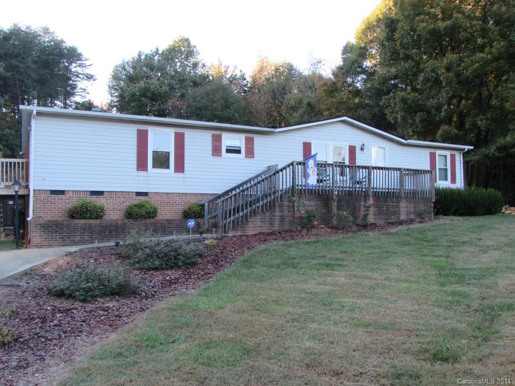 Country living at its best! Updated 3BR/2BA double wide featuring hardwoods, ceramic tile, ss appliances, woodstove, split bedroom plan, newer HVAC and roof. Backyard area perfect for entertaining with large deck, above ground pool, fit pit and large detached storage ALL sitting on 2+ acres in Clover School District.