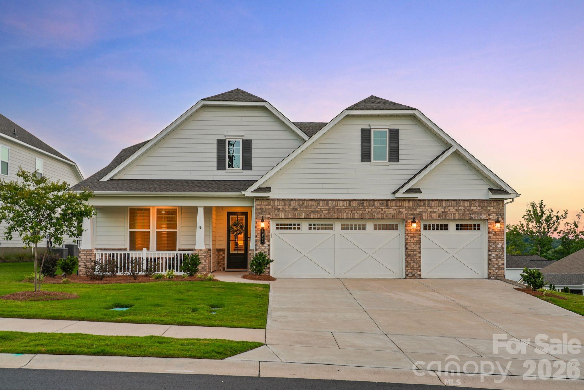 Perfectly positioned within the amenity-rich 55+ community of The Gentry at Handsmill, this exceptional property pairs year-round water views with luxury upgrades at every turn. Featuring 3 beds, 3 baths, a dedicated den/office and spacious lanai, this beautifully appointed home offers the perfect blend of open-concept living, high-end finishes, and effortless indoor-outdoor flow — all set against a backdrop of tranquil water views you'll enjoy right from your own backyard.

Step inside and be greeted by an abundance of natural light pouring through the open-concept living space. Thoughtful architectural details elevate every room, including a striking coffered ceiling, designer-updated lighting throughout, and beautifully curated accent walls that add warmth and character. The gourmet kitchen is a true showstopper, featuring premium cabinetry, large island, and a custom-built pantry designed for both style and function. The sunroom extension further enhances the home's bright, open feel while creating the perfect place to relax and take in the peaceful water views.

Designed with entertaining and everyday enjoyment in mind, the outdoor spaces are just as impressive. Relax year-round in your oversized screened-in lanai, or step out onto the extended patio to gather and grill. Walk to your custom fire-pit area, while taking in unobstructed, year-round water views. Professional irrigation and meticulously maintained landscaping frame the property beautifully, creating a private backyard oasis that feels like a permanent vacation.

Even the garage impresses, with a 4-foot extension providing extra room for storage or hobbies, durable epoxy flooring, and an additional 375 square feet of attic storage — a portion of which is conditioned for year-round use. Every detail of this home has been thoughtfully upgraded, making it truly move-in ready and designed to impress from the moment you arrive.

Beyond the home itself, The Gentry at Handsmill offers an exceptional 55+ lifestyle designed for both convenience and recreation. HOA-maintained lawn care means more time to enjoy what matters most. Boaters and outdoor enthusiasts will appreciate the option to lease boat slips or jet ski slips and access to a dry boat and RV storage lot. Two private marinas, including one with a convenient boat launch, make spending the day on the water effortless. The impressive community amenities continue at the clubhouse, featuring a fully equipped fitness center, a large swimming pool, and a splash pad that's perfect for visiting family and grandchildren. An active calendar of social clubs and community events offers endless opportunities to connect with neighbors, whether you're joining a new hobby, staying active, or simply enjoying everything this vibrant community has to offer.

This is more than a home — it's a lifestyle upgrade. With premium finishes inside, breathtaking views outside, and an unbeatable amenity package, this property truly has it all. Don't miss your chance to make it yours — schedule your private showing today and experience firsthand why this home exceeds every expectation.