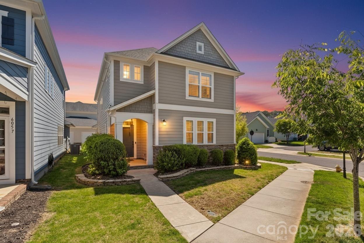 Perfectly positioned on a corner lot at the end of a quiet street, directly across from the neighborhood dog park, this beautifully maintained home offers both comfort and convenience in an unbeatable location. With easy access to I-85, commuting to Charlotte is effortless, while the charm, dining, and local shops of downtown Belmont are just minutes away.

The main level features a bright, open-concept layout designed for everyday living and entertaining, with seamless flow between the kitchen, dining, and living spaces. You’ll love the updated kitchen, complete with stainless steel appliances, granite countertops, tile backsplash, farmhouse sink, and a spacious pantry. Step outside to the side patio and fenced yard—perfect for relaxing or hosting.

Recent updates include fresh paint, and beautifully updated bathrooms, giving the home a clean, modern feel. The spacious primary suite offers a comfortable retreat with hardwood floors, a sitting or workspace area, and a well-appointed en-suite bath featuring dual vanities, a large tiled walk-in shower, and a generous closet.

Additional upgrades include plantation shutters, crown molding, custom lighting, a drop zone at the garage entry, built-in beverage fridge, and a thoughtfully designed laundry room with cabinetry and a built-in ironing board. Outdoor features a hardscape patio with lighting, and a fenced yard.

The community itself is a standout, offering a welcoming atmosphere with amenities such as a pool, clubhouse, playground, green spaces, and a dog park—making it easy to enjoy both neighborhood living and an active lifestyle.