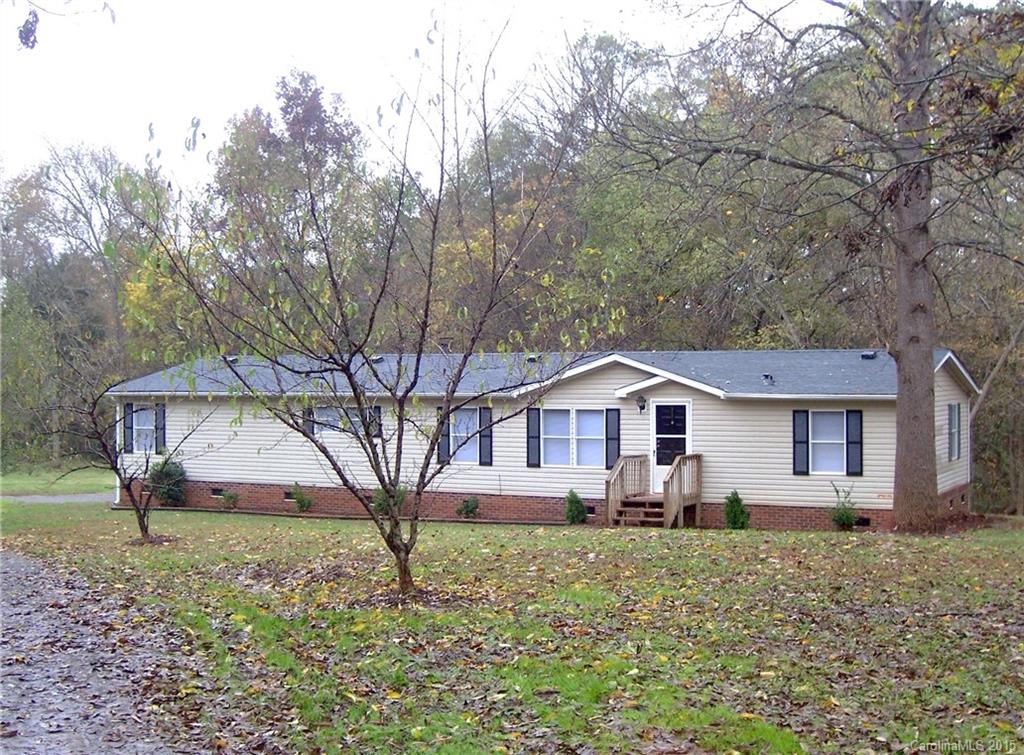 Sitting on a 5.89 acre lot, this totally refurbished home has a new roof, paint, carpet & vinyl, appliances, lighting, and More! No work to do here! Relax and enjoy quiet country living and horses allowed.