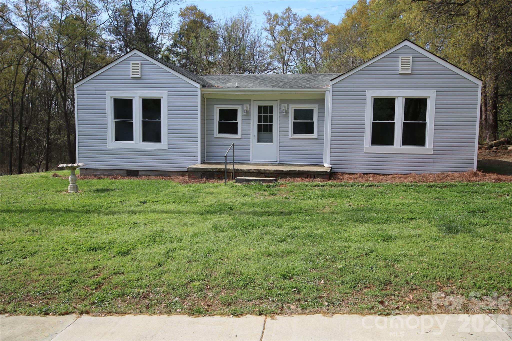 Cute 3 Bedroom, 1.5 Bath home conveniently located near schools, grocery store, shopping and eating establishments. Features: Living Room, Kitchen with New Countertops, New Range and new Microwave, Bonus Room, enclosed backporch (laundry hookups). new vinyl siding, Architectural Roof (2024), new windows (except back porch), fresh paint inside and out, bathrooms have new sinks and commodes. Gas forced air heat, No A/C.  Large backyard for enjoyment. Agent related to seller.