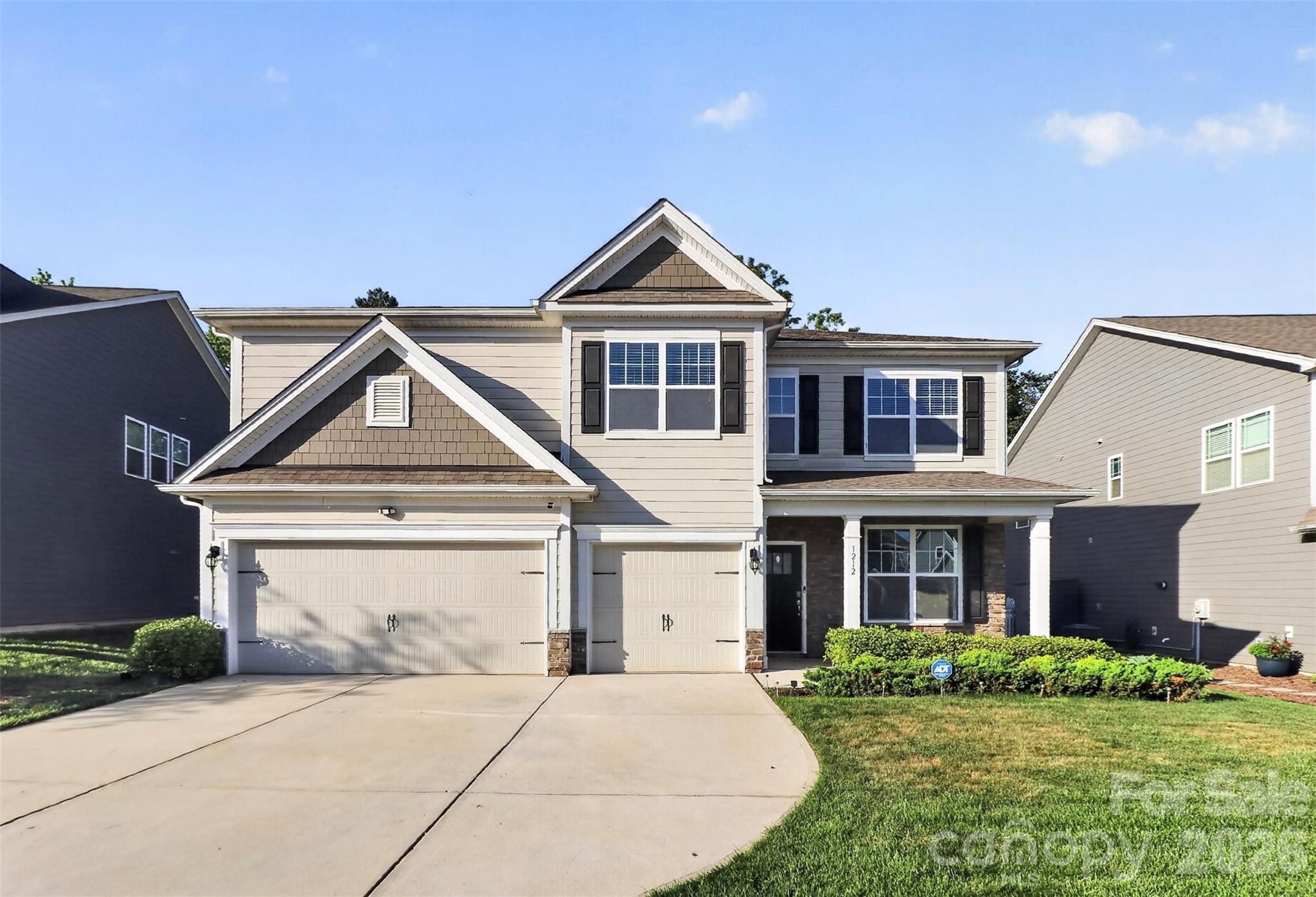 Nestled in the highly sought-after Cypress Point community in Lake Wylie, this stunning 5 bedroom, 4 bath home is the complete package - including a coveted 3-car garage! From the moment you step inside, you'll notice thoughtful design and upscale finishes throughout. A dedicated home office with elegant French doors creates the perfect work-from-home setup. The chef's kitchen is the heart of the home, boasting a gas range, double wall oven, large center island, abundant cabinetry, walk-in pantry, and a sunny breakfast area. The kitchen flows seamlessly into the dining room, making entertaining a breeze. A first-floor bedroom and full bath provide the perfect guest suite or multi-generational living space. Upstairs, the primary suite is a true retreat, featuring a serene sitting room ideal for unwinding after a long day. The beautifully appointed primary bath features dual walk-in closets, dual vanities, an oversized luxury shower and separate soaking tub. An enormous bonus room offers endless possibilities for a home theater, playroom, home gym, game room, etc. New carpets throughout! Enjoy pleasant evenings out in your fully fenced, private backyard oasis, whether entertaining or relaxing in the hot tub under the stars. Walk the short distance to the neighborhood amenity center including a resort-style pool, club house, 24-hour fitness center, playground, sports courts and pavilion. There is so much to love about this home. All appliances remain. Schedule your showing today!