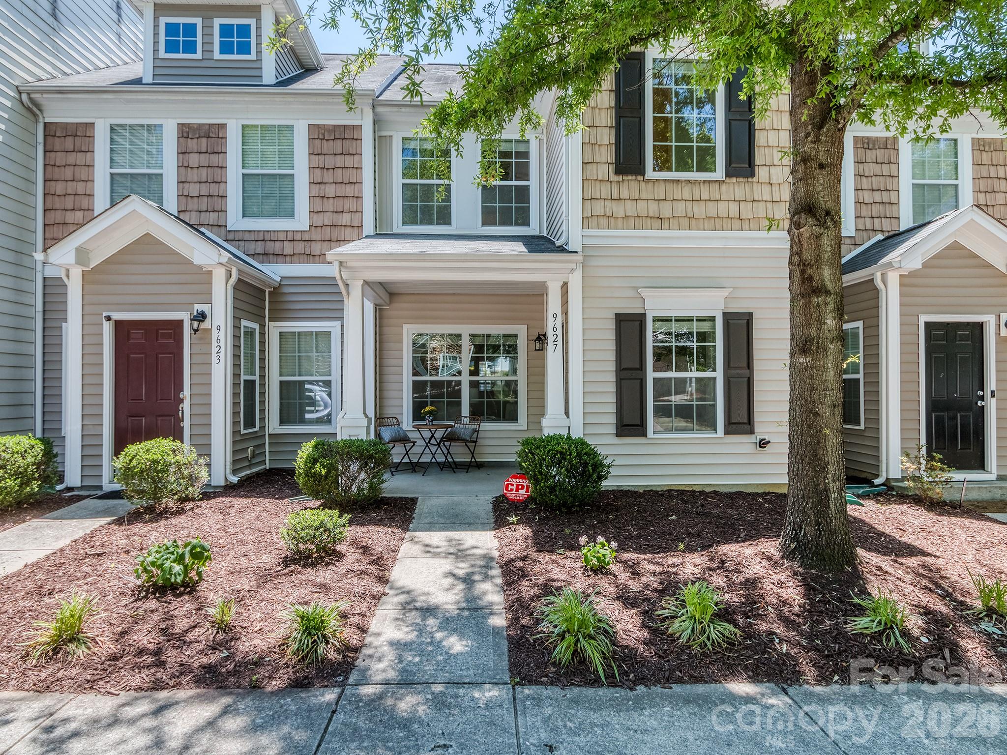Welcome home to this charming, freshly painted 2 bedroom, 2.5 bath townhome located in the cozy and quiet Cedar Mill community! This open concept floorplan offers comfortable everyday living with great flow between the kitchen, dining, and living spaces. Each spacious bedroom features its own private en-suite bathroom and walk-in closet, offering comfort, privacy, and plenty of storage.

Enjoy relaxing mornings on the inviting front porch or unwind in the screened-in back porch complete with an additional storage closet. The home also features a new garbage disposal for added convenience.

The home includes one assigned parking space, and one designated visitor parking spot, along with additional open street parking directly in front of the home for guests.

Cedar Mill offers fantastic neighborhood amenities including an outdoor pool, workout room, playground, sidewalks, and street lights, creating a welcoming community feel.

The HOA makes for low-maintenance living by including landscaping and yard maintenance, water, sewer, and trash service.

Ideally located this home offers quick access to Charlotte Douglas International Airport, the U.S. National Whitewater Center, and charming downtown Mt. Holly with its local restaurants, breweries, shops, and seasonal events. Enjoy nearby outdoor recreation including hiking, kayaking, rafting, biking trails, and live music at the Whitewater Center, plus convenient access to Belmont, Mountain Island Lake, and Uptown Charlotte.

This townhome presents an excellent opportunity for buyers looking for value in the area.  This home is competitively priced and offers an incredible chance to enjoy the Cedar Mill lifestyle at an attractive price point.

This location perfectly blends convenience, recreation, and small-town charm while offering easy, low-maintenance living in one of the area’s most desirable areas!