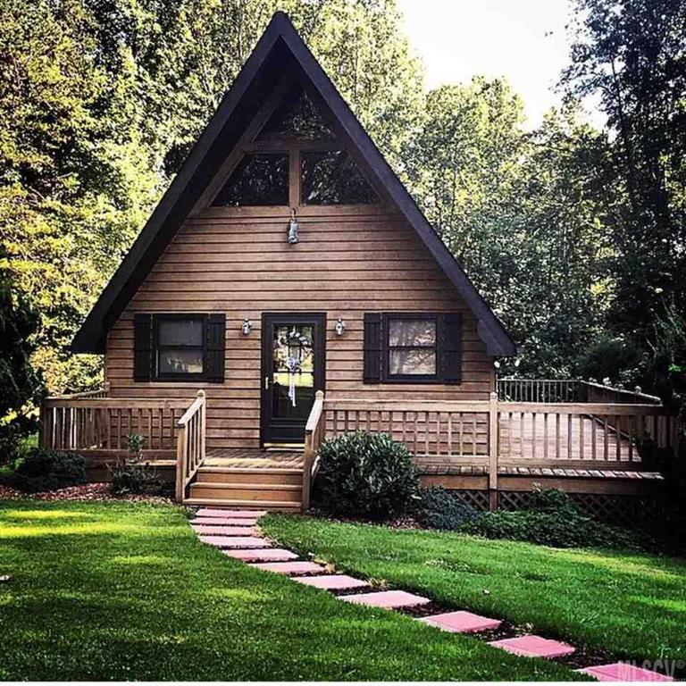 A-FRAME HOME ON 1.55 ACRES!  HOME HAS BEAUTIFUL LAWN, LARGE WRAP AROUND DECK, AND IS SITUATED AT END OF STREET FOR PRIVACY.  MAIN FLOOR HAS LIVINGROOM, KITCHEN, ONE  BEDROOM, BATH AND LAUNDRY. UPSTAIRS HAS SECOND BEDROOM AND LOFT AREA. VERY CUTE HOME WITH LOTS OF YARD AND IS IN GREAT CONDITION.