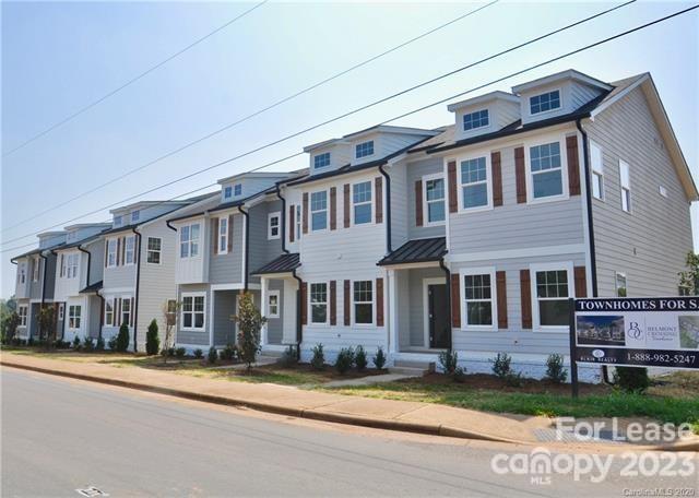Beautiful Belmont Farmhouse Style New Construction 3 Bedroom, 3 bath Townhome with 2 Car Garage PLUS additional unfinished basement square footage! Just a short stroll to downtown Belmont. This Townhome includes center island, white cabinets, granite countertops, ceramic tile backsplash, vinyl plank wood flooring on main floor, frameless shower doors, stainless appliances including double door refrigerator, nest front doorbell camera, pre-wired smart home box and back balcony porch. Close to shopping, restaurants, interstates, lake and schools.