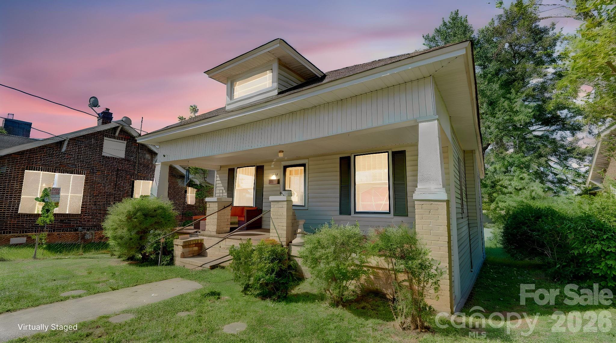 This 1925 bungalow offers classic charm and significant potential in the Fulton Heights Historic District. The approximately 1,202 sq. ft. home features high ceilings, spacious rooms, and original hardwood flooring throughout. Relax on the iconic rocking chair front porch or enjoy the level backyard, which includes space for a potential canopy seating area.Kitchen is a functional space equipped with a dishwasher and unique historical elements like a washboard sink and glass-front cabinetry. Enjoy an evening stroll or morning run in a historic area. Per seller the HVAC is functional but will require replacing due to age. Home needs some TLC so priced accordingly.