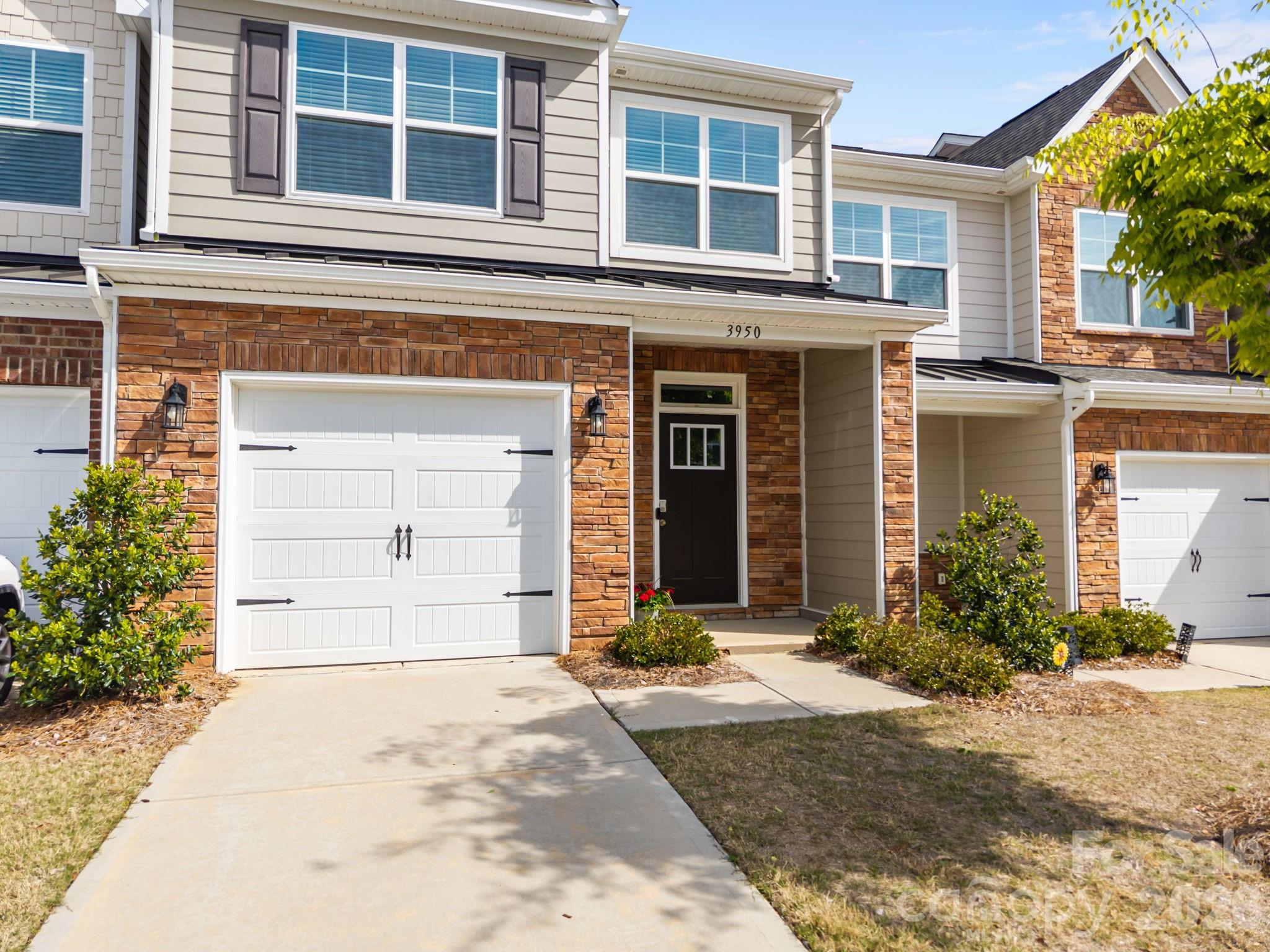 Investors and Buyers! 
Tucked into a peaceful setting with nature right in your backyard, this beautifully maintained 3 bedroom, 2.5 bath townhouse offers the perfect blend of comfort and convenience. The true standout feature is the serene back view your private outdoor space backs directly onto a paved walking trail, surrounded by mature trees and a natural area, creating a tranquil retreat ideal for morning coffee or evening unwinding.

Inside, you’ll find a thoughtfully designed layout with modern finishes throughout. The kitchen shines with sleek quartz countertops, a gas range perfect for cooking enthusiasts, and ample space for entertaining. The open-concept living and dining areas flow effortlessly, making everyday living both functional and inviting.

Upstairs, three spacious bedrooms provide flexibility for family, guests, or a home office, while the 2.5 bathrooms add convenience for busy households. An attached garage completes the package, offering both storage and ease of access.

Enjoy the best of both worlds—peaceful, nature-filled surroundings with everyday conveniences just minutes away. Located less than a mile from restaurants and shops, you’ll have easy access to dining, shopping, and daily essentials while still coming home to a quiet, scenic retreat. The neighborhood also offers fantastic amenities, including playgrounds, a dog park, and an outdoor pool—perfect for relaxing, staying active, and enjoying time with family and friends.