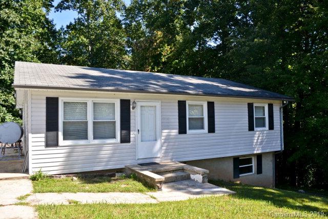 Great location. New vinyl siding, heat pump, and windows. Lots of potential with full basement, plumbed for bathroom. Located near end of dead end street. Main floor has large living room and bedrooms, with large partially renovated bathroom.  Separate lower drive for basement. Partially fenced in back yard, many possibilities.