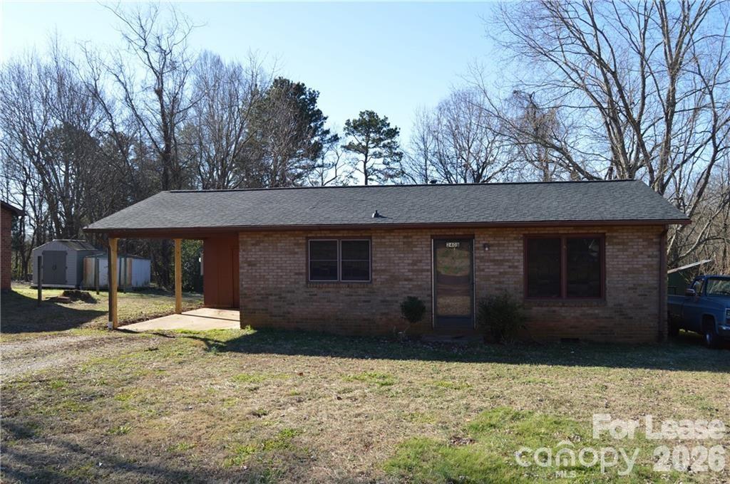 All brick, two bedroom one bathroom home located near Downtown Statesville and I40. Central heating and air, open kitchen, and sizable living room. Covered carport with laundry area in carport area. All tenants must apply. Please contact listing office for more information. One year lease agreement with one month deposit required.