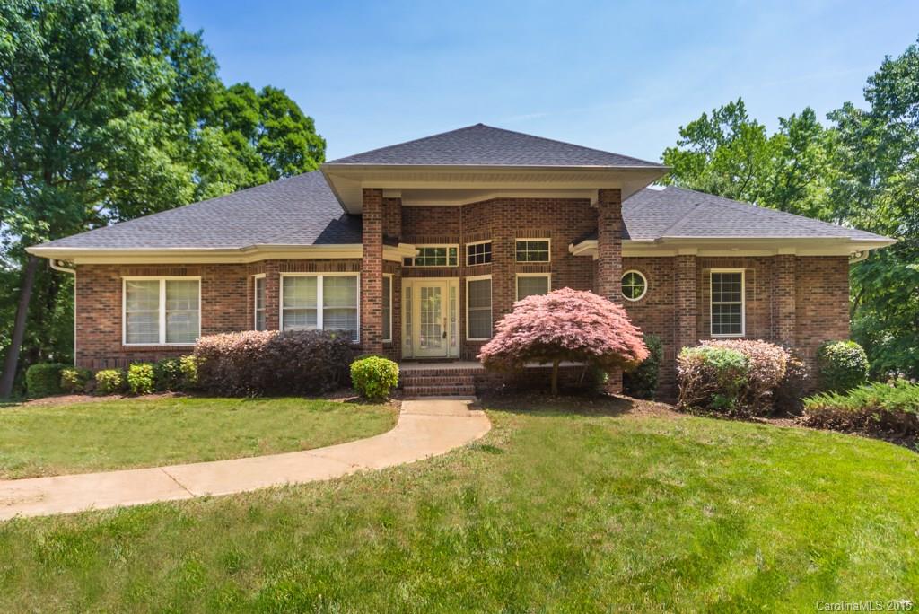 Gorgeous waterfront brick home w/absolutely beautiful view of Lake Wylie. Gated Entry. Very open floor plan w/wood floors, Family kitchen with eat-in area, granite. Full basement w/rec  room, bonus/ 4th bedroom & bath,  Formal Dining, Living Room w/wet bar. Great Room w/fireplace. Master on main w/French doors to deck, WIC, Grand Master Bath with 2 sinks, whirlpool, sep shower. Covered porch. Deep Water, beach, 4 JetSki lifts, boat lift, boat ramp, ready for summer. Clover Schools, low SC taxes.