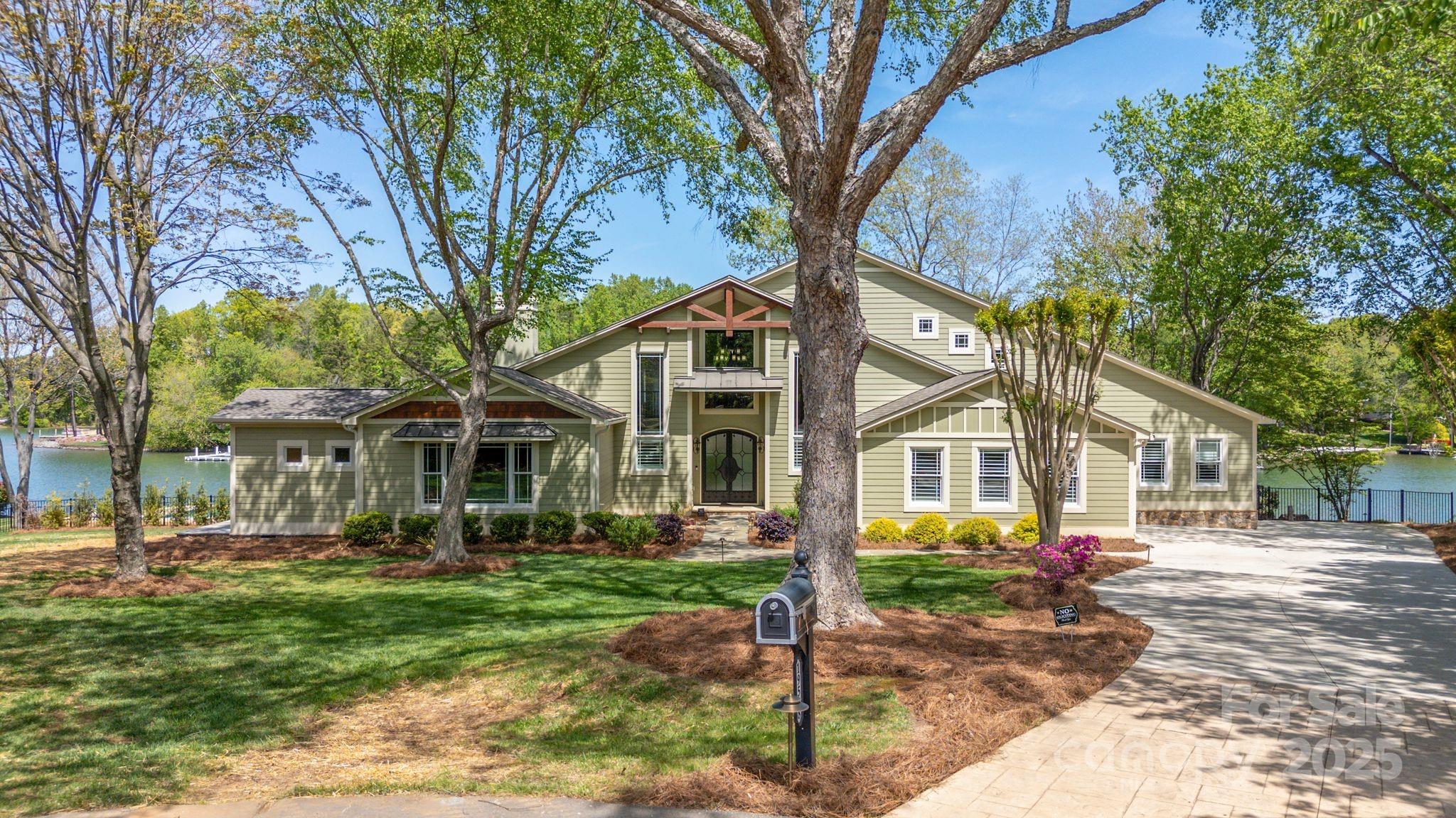 Experience Luxury Lakefront Living.
Looking for a home with an upscale lake house feel? This stunning property in Patrick’s Purchase offers the perfect blend of elegance and waterfront charm—featuring over 300 feet of pristine shoreline!  
Designed for both comfort and entertaining, this home boasts TWO primary suites on the main level and three additional bedrooms upstairs. Step outside to a brand-new pool and expansive outdoor entertaining area, complete with a large covered deck, screened porch, and a covered waterfront retreat. Whole house water filtration system added in 2022. Inside, you’ll find gorgeous 200-year-old reclaimed walnut floors, adding warmth and character to this luxury lake home. The oversized kitchen island is ideal for hosting large gatherings, making this home an entertainer’s dream. Three car garage. Don’t miss your chance to own this extraordinary lakefront retreat. Pool is salt water, and not heated.