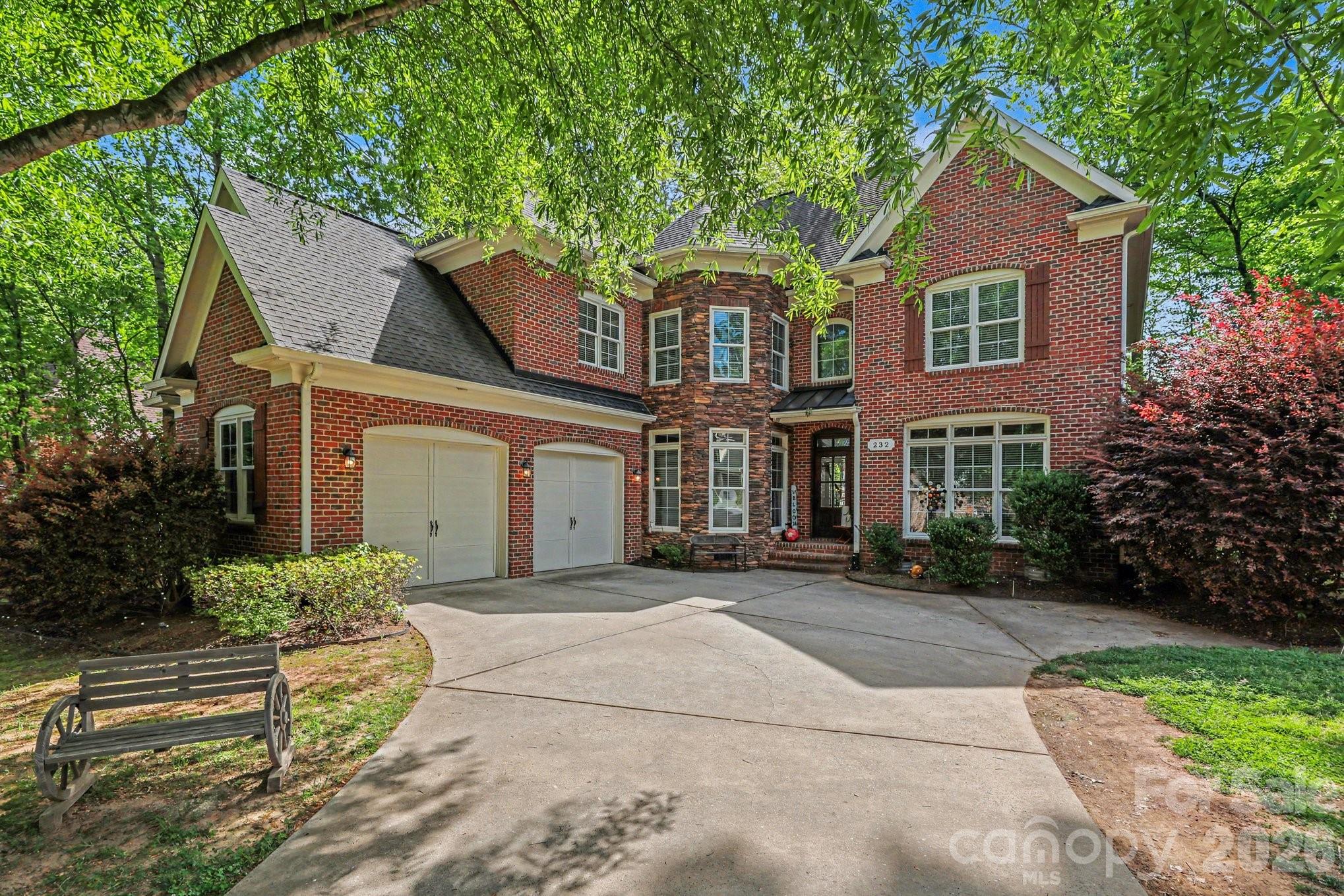 Beautiful custom brick and stone executive home in the highly sought-after Treetops at Cowan’s Ford! This light-filled open floor plan showcases a stunning great room with soaring two-story windows and a gas fireplace with a striking stone hearth.

Designed with both elegance and functionality in mind, the home features refined custom details, fresh neutral interior paint, and newly refinished flooring throughout. The spacious kitchen offers custom cabinetry, a generous eat-in area, and is perfect for everyday living and entertaining.

The luxurious primary suite is a true retreat, complete with tray ceilings and a private sitting area. Gorgeous hardwoods flow throughout the home, enhancing its timeless appeal.

Offering 5 bedrooms, 4.5 bathrooms, and a 2-car garage, this home provides ample space for comfortable living. Ideally located just minutes from Hwy 16, I-77, and Birkdale Village, it delivers both convenience and lifestyle.

A must-see!
