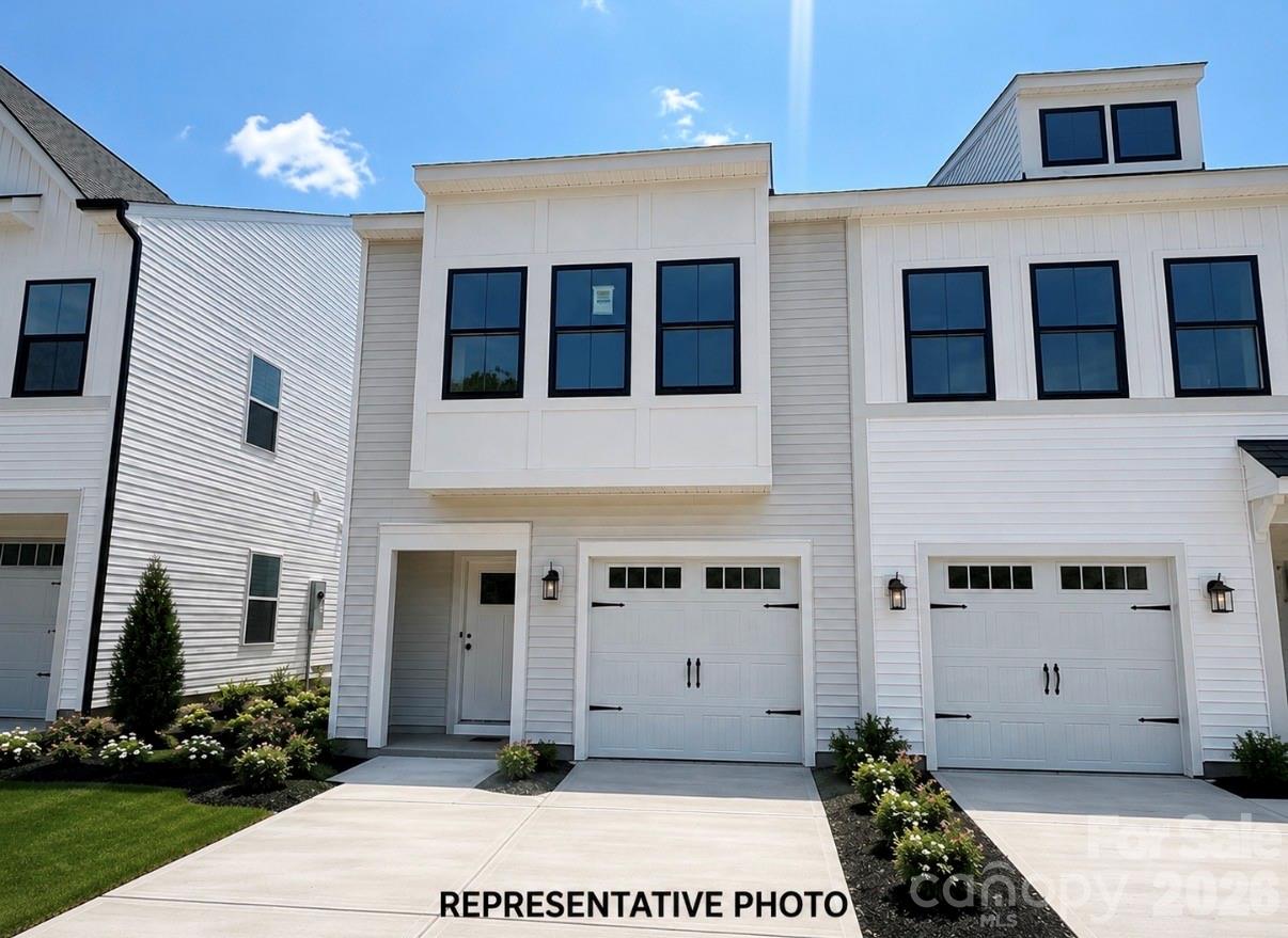 Step into this beautifully designed two-story townhome featuring 3 spacious bedrooms and 2.5 baths. From the moment you walk in, you’re welcomed by a charming entry hallway that leads past the staircase and powder room into a bright, stylish eat-in kitchen. The open-concept layout flows seamlessly to a private patio, perfect for relaxing or entertaining and creating an effortless indoor-outdoor feel. Upstairs, the primary suite offers a comfortable retreat complete with dual vanities and plenty of space to unwind. The conveniently located laundry closet sits just outside the primary suite for everyday ease. Completing this thoughtfully designed floor plan is a spacious mudroom and a one-car garage, offering both function and style.