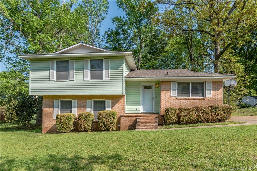 Cute as a button on private wooded lot with no HOA. Split level ready for you to update but move in ready. Close to highways and shopping just south of the state line with bypass access one street away. Solid value in sought after Fort Mill Schools subdivision