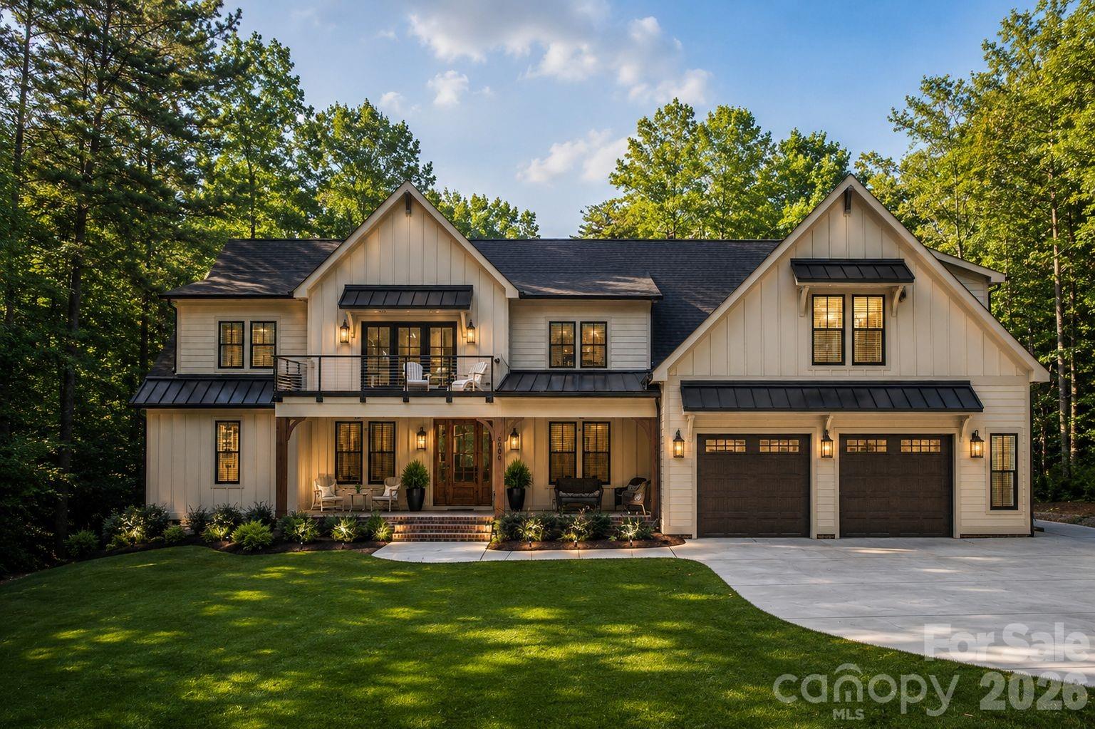 This custom-built home is tucked away on a secluded road, creating a private, mountain-like setting just minutes from Lake Norman. Thoughtfully designed with elevated finishes and flexible living spaces, this 4-bedroom, 4.5-bath home offers a rare blend of luxury, privacy, and functionality. The open floor plan centers around a spacious family room with a gas fireplace and a chef’s kitchen featuring stainless steel appliances, a hidden walk-in pantry, oversized island, and seamless flow for everyday living. The main-level primary suite includes heated bathroom floors and a custom walk-in closet, along with a dedicated office and full-size laundry room. Sliding glass doors open to an expansive 320+ sq. ft. screened porch overlooking the private backyard setting, with ample space to add a pool and create your own outdoor retreat surrounded by nature. Upstairs, a large loft opens to a cocktail terrace with seasonal water views, while three additional bedrooms each feature their own full bath. One of the upstairs suites offers a private exterior entrance, making it ideal for a secluded office, guest suite, studio, or multigenerational living. The 3-car garage includes EV charger capability and a drive-through bay perfectly suited for a boat, golf cart, or additional storage. Located less than five minutes from the public boat ramp at Beatty’s Ford Park, this home offers the feeling of a private getaway while still being close to everything Lake Norman has to offer.