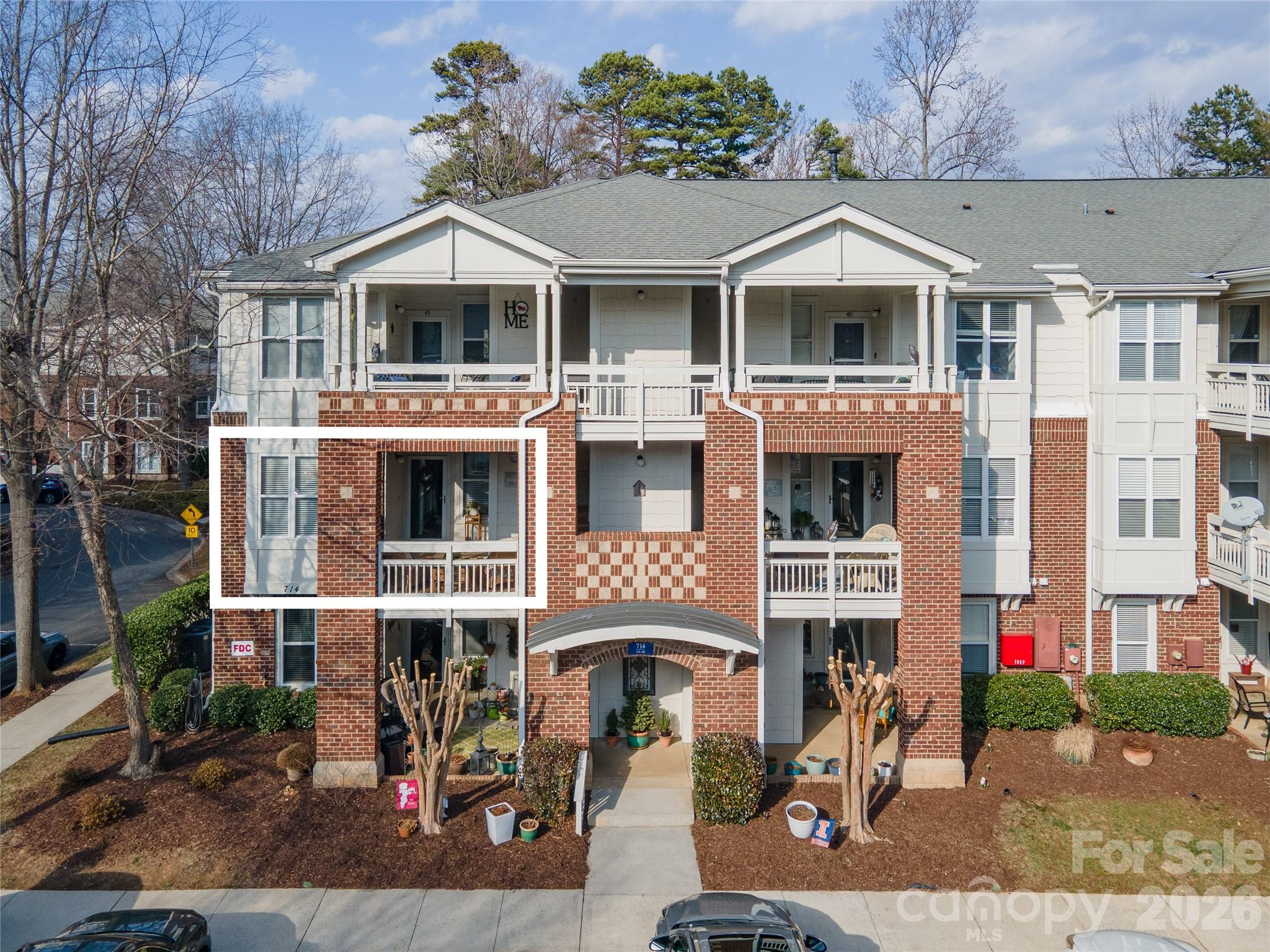 WATERFRONT  END UNIT  2nd floor condo with elevator in peaceful and tranquil location on Lake Davidson. Large primary bath with tiled shower,  GR with fireplace (logs replaced in 2017), Kitchen with all appliances included. Eating bar, granite counter tops, stainless appliances, and a large stainless sink. The Dining area has a bay area and extra windows for enjoying your meals while looking at the lake. Master Suite w/ dual sink vanity and large tiled shower. 2 additional spacious bedrooms share 2nd Full Bath with tub/shower combination. Wood look tile flooring was replaced 2019, and is in pristine condition. HVAC is Trane Comfort System and Water heater both replaced in 2021. You'll feel like you are on vacation while enjoying the views from the Covered back Deck or front porch. Walk to restaurants, groceries, and many events on "The Circles" in Davidson.  Only minutes from Davidson College and the quaint downtown with restaurants and shopping of Davidson. Community has kayak storage, pool & walking trails. Boat slips available through Main Street Management.