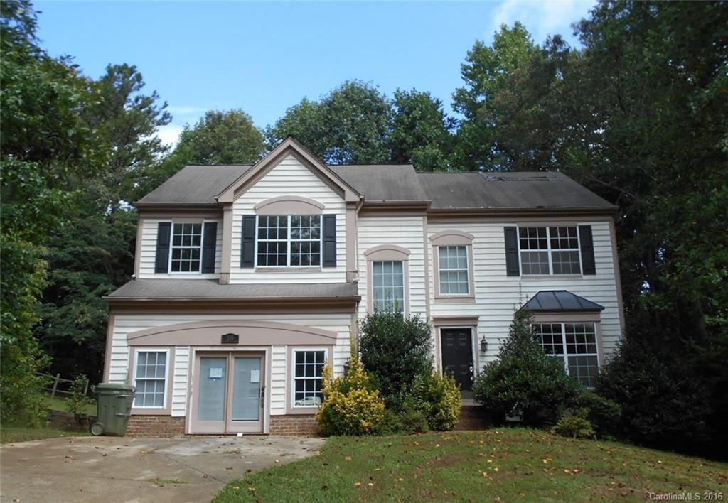 Multiple offers  Seller has requested highest and best by Noon on 9/14/2016. Needs structural repairs and will not qualify for conventional financing. The previous owner added designer quality, ornamental wooden cabinets in bathrooms, upgraded light fixtures, stamped ceramic tile backsplash in kitchen. The garage has been converted to rec room and separately heated and cooled. Stainless appliances. Formal living/dining combined with heavy moldings and columns. 2 story foyer has hardwood floors.