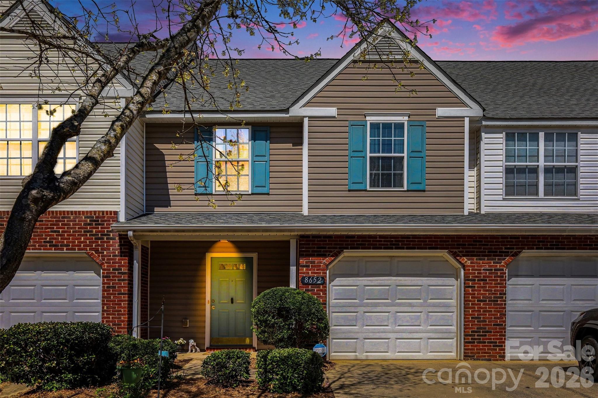 Move-in ready and thoughtfully updated, this 2-bedroom, 2.5-bath townhouse offers low-maintenance living with stylish touches throughout. Located in Ballantyne with its top-rated schools, this home is just 5 minutes to Morrison YMCA and only 3 minutes to Stonecrest. The main level features updated wood laminate flooring and a freshly painted interior, creating a clean and inviting space from the moment you enter. The kitchen and living areas flow seamlessly, making everyday living and entertaining easy.

Upstairs, both bedrooms offer comfortable retreats with convenient access to their own bathrooms. The utility room also includes new flooring.

Enjoy outdoor living in the private, fenced back patio—perfect for relaxing or hosting guests. A single-car garage provides additional storage and convenience. Community amenities include an outdoor pool, and lawn maintenance is included, allowing you to spend more time enjoying your home and less time on upkeep!