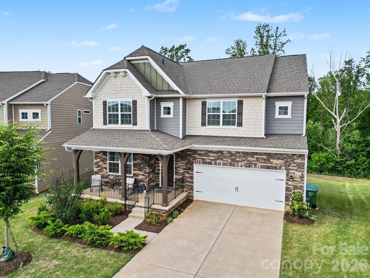 Huge, rubbished basement Located in the highly sought-after Elizabeth community in Fort Mill, this stunning five-bedroom home offers exceptional living with resort-style neighborhood amenities including an outdoor pool, spacious clubhouse, pickleball courts, and playgrounds.

Inside, the gourmet white kitchen is filled with natural light and designed to impress, featuring updated stainless-steel appliances including double wall ovens, cooktop grill, dishwasher, microwave, ice maker refrigerator, beautiful 42-inch cabinetry, distractive pattern granite countertops, and a large statement island that anchors the space. The adjoining breakfast area flows seamlessly into the inviting great room highlighted by a cozy gas-log fireplace.

The main level also includes a bedroom and full bath, making it ideal for guests or a private home office.

Upstairs, you’ll find the spacious primary suite along with three additional bedrooms. The luxurious primary bath features a long dual-sink vanity, relaxing double door separate shower.

The unfinished basement offers tremendous expansion potential and is partially finished, providing excellent space for entertainment, recreation, or additional storage. A second-floor deck overlooks the open backyard, creating the perfect setting for relaxing mornings, outdoor dining, or enjoying peaceful views.