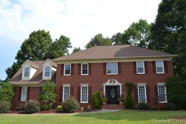 This is a beautiful all brick home with a soaring 2-story foyer. Formal LR and DR, great room with fireplace. The cook in the family will enjoy the updated granite kitchen with stainless appliances, work island, tile backsplash.  Upstairs houses all of the bedrooms as well as a large bonus room. Hardwood and ceramic tile flooring throughout the entire home. Enjoy your morning coffee or a cocktail in the evening on the awesome screen porch.  Some replacement windows and partially fenced backyard.